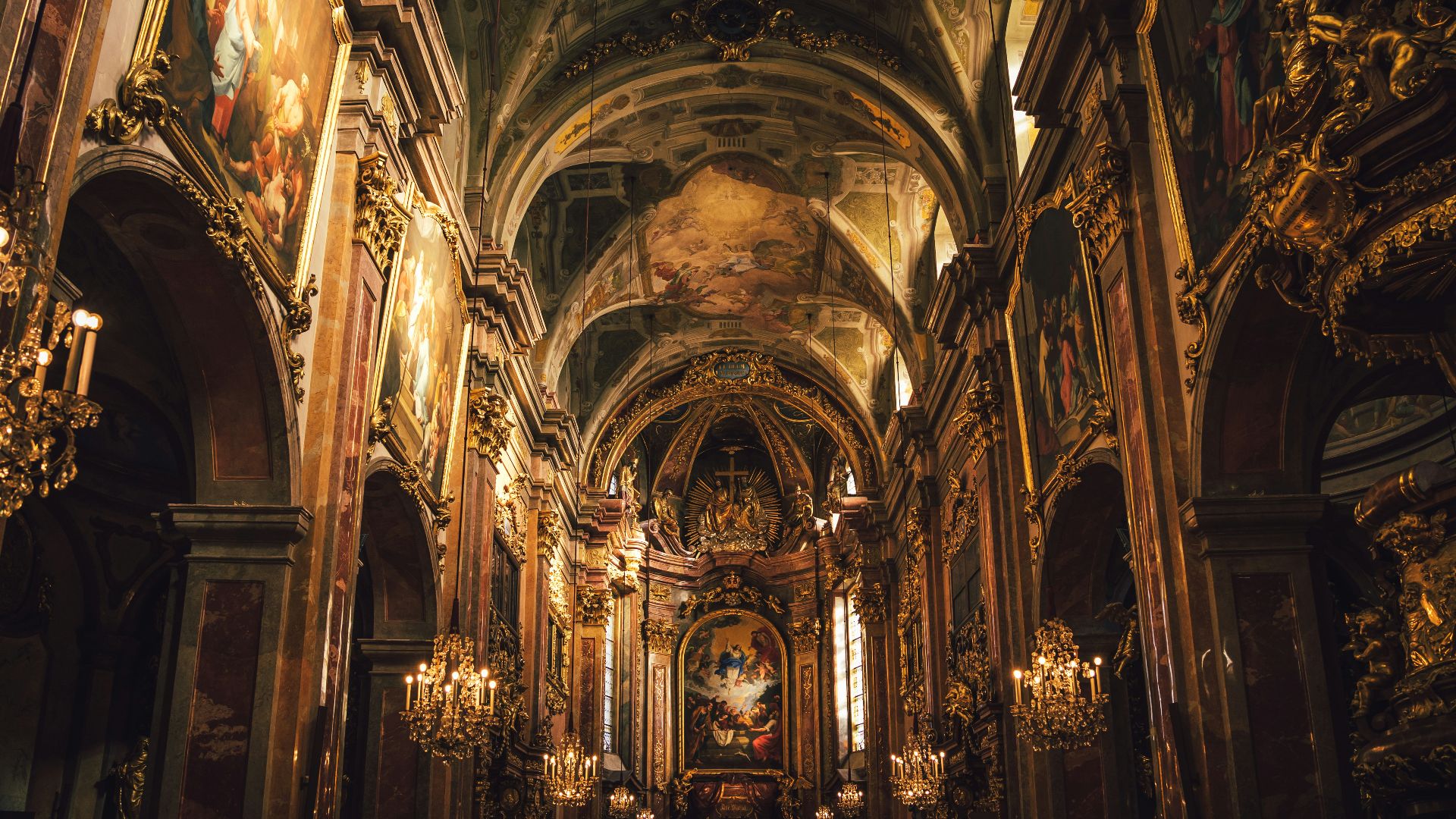 the interior of a church with gold decorations