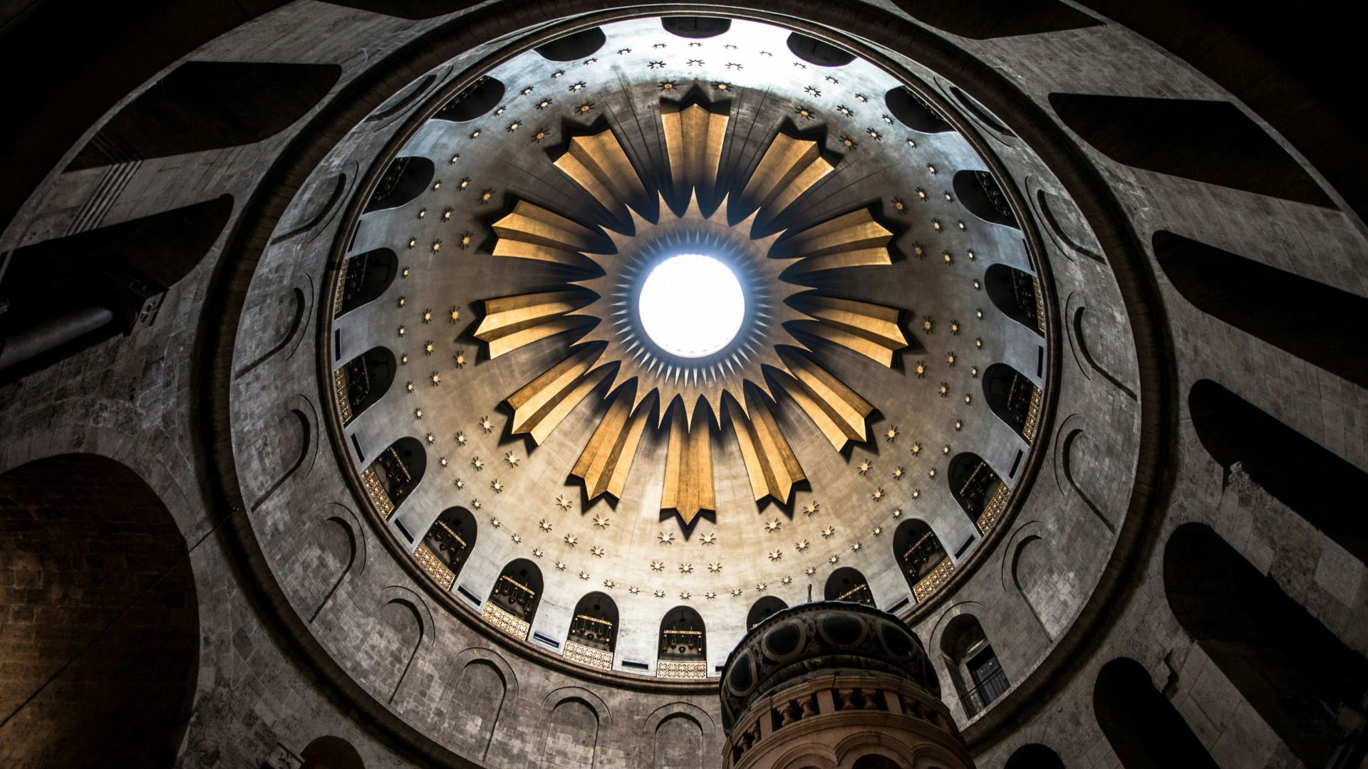 a large clock on Church of the Holy Sepulchre