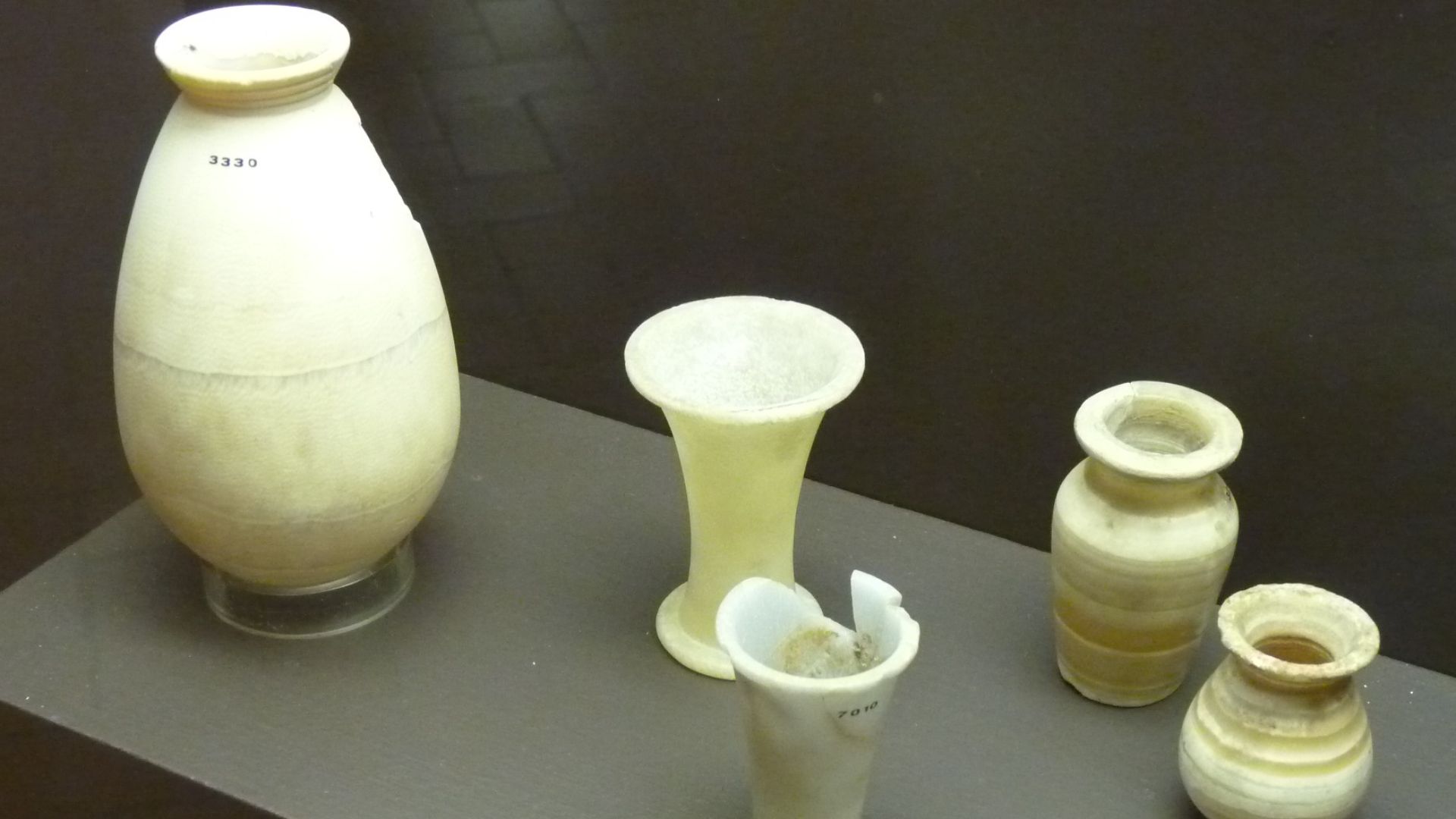 Alabaster vessels, unknown provenience, Middle Kingdom. Florence, Museo archeologico nazionale, Room 1.