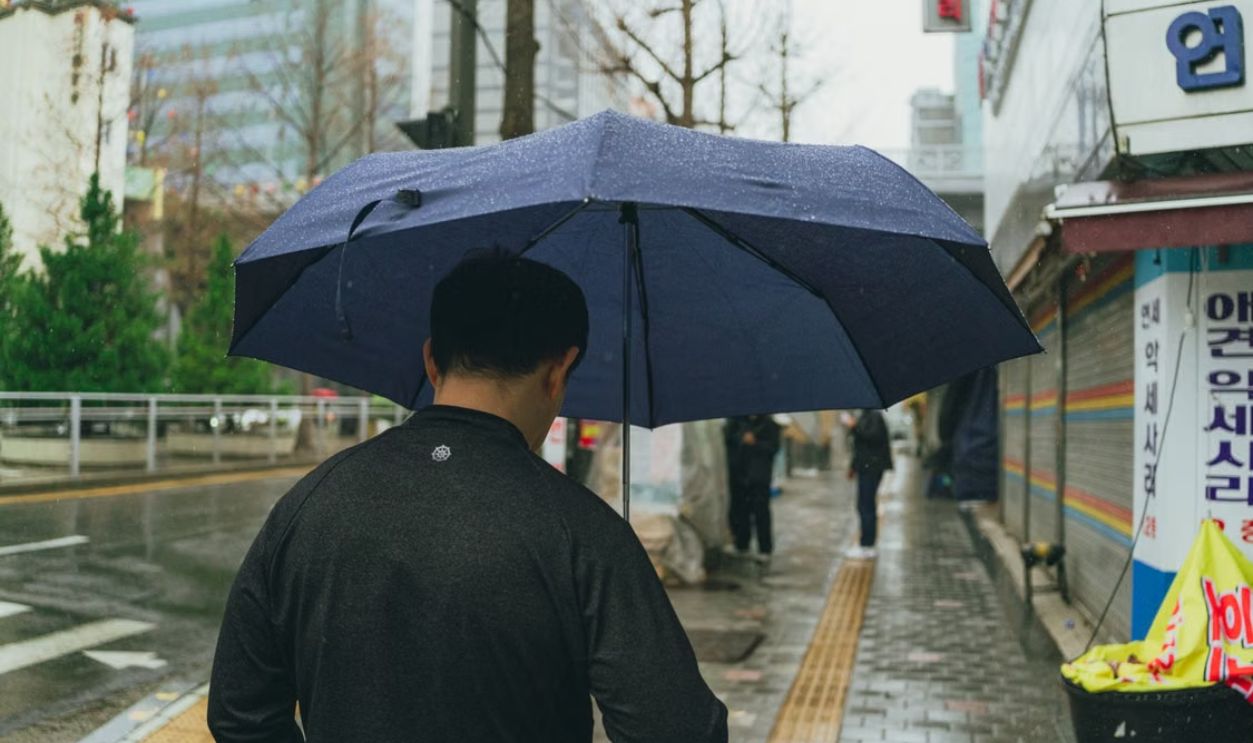 man in the rain