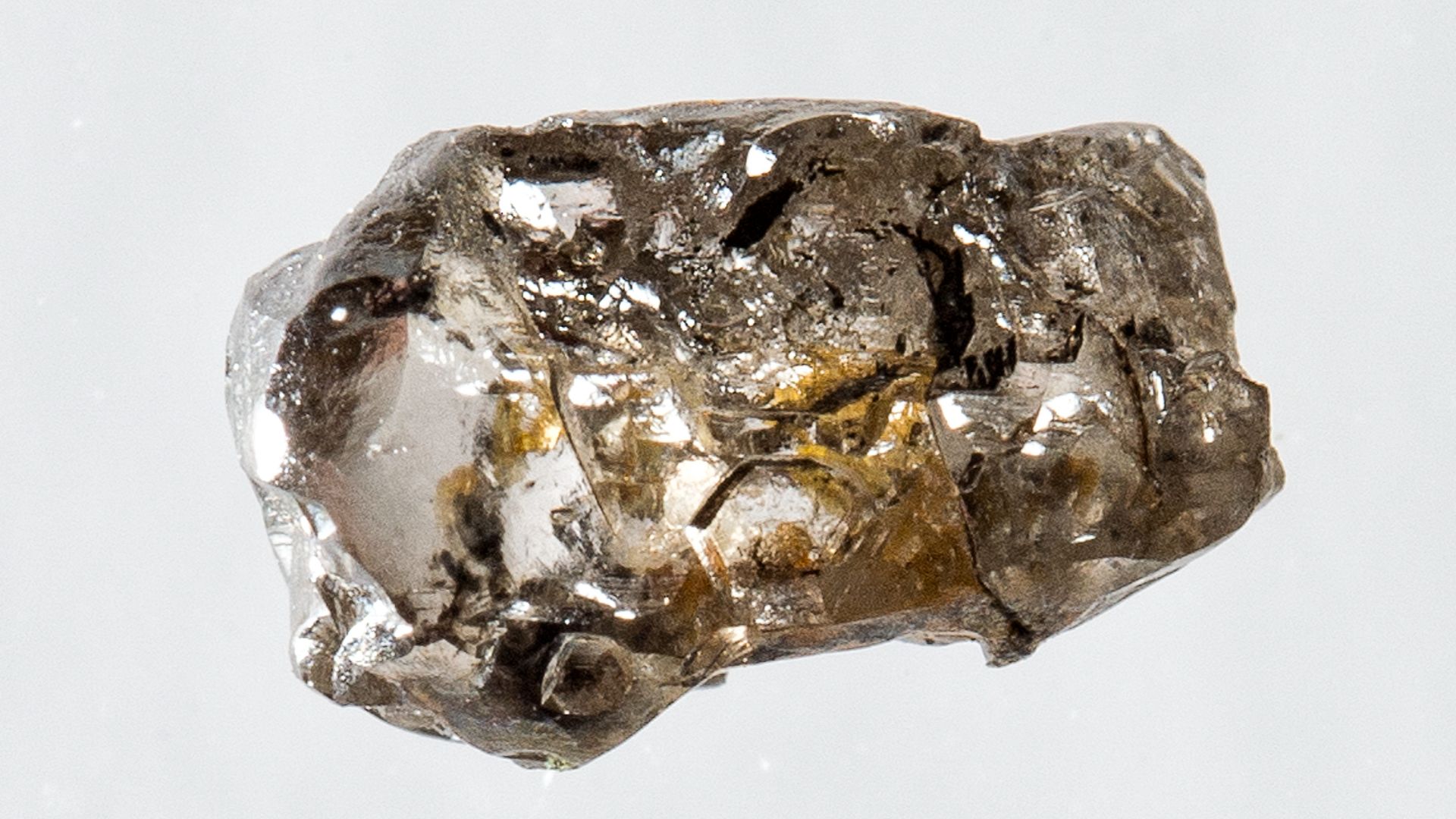 This image is of a diamond from Juína, Brazil with ringwoodite inclusions, which provides evidence for the presence of water in the transition zone.