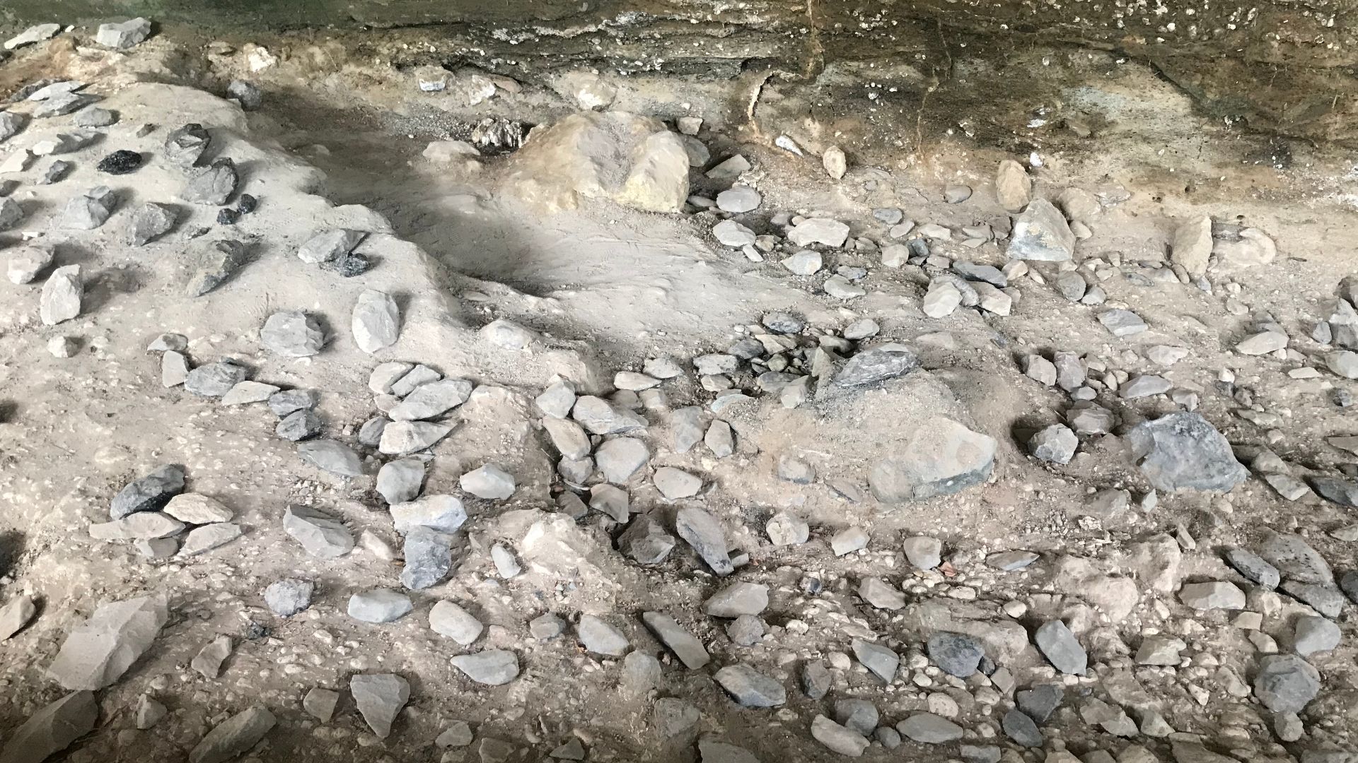 A photograph of the upper pre-historic archeological site at the Kariandusi Museum in Kenya. The photograph is of the extensive collection of Acheulean hand-axes excavated by Louis Leakey in 1928. The hand-axes are from the Lower Paleolithic era and are m