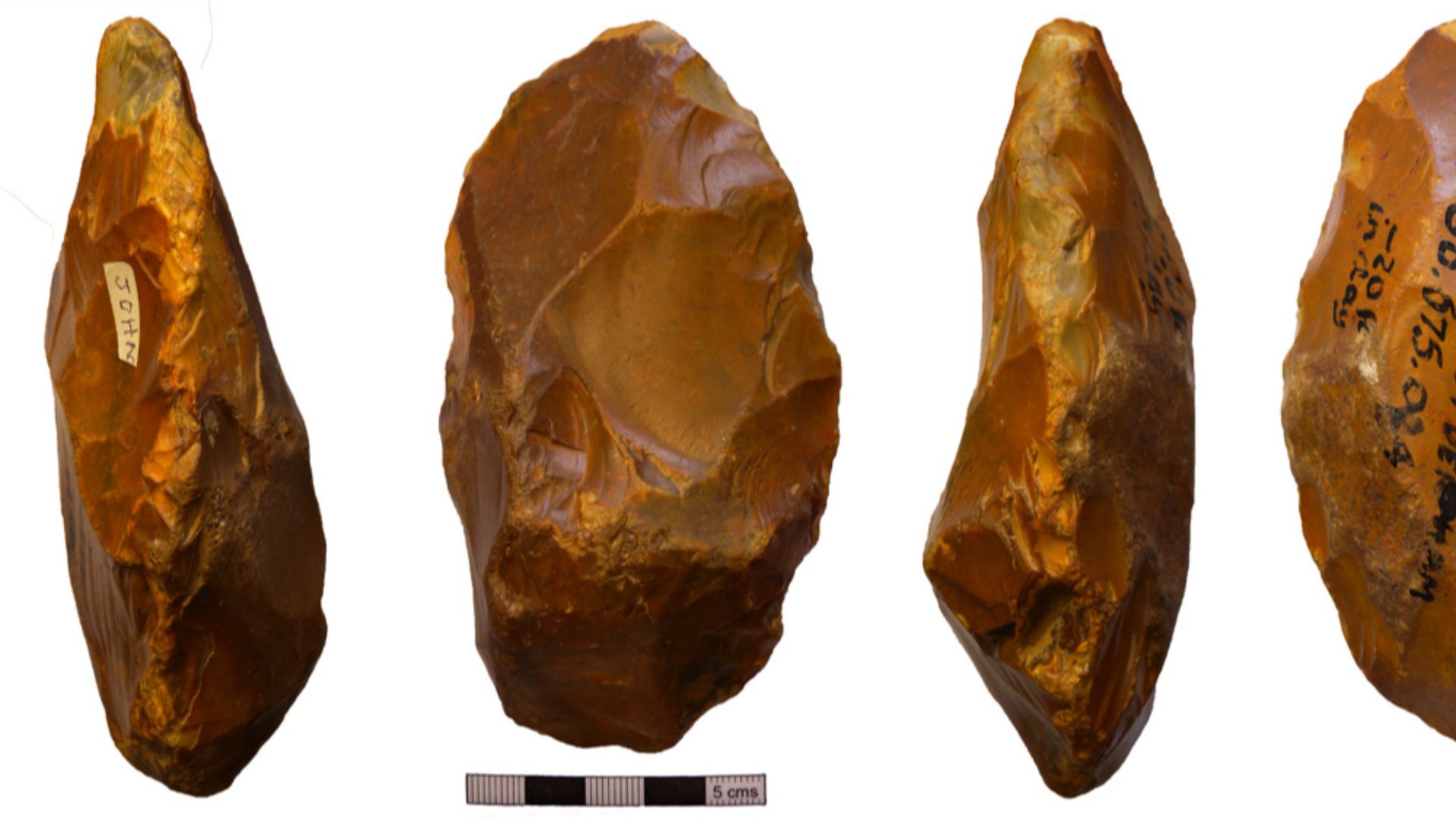 Lower Palaeolithic flint hand axe of Wymer's type D (1999), of asymmetrical plan and profile, with fairly straight cutting edges, all flake removals are hard hammer struck. It appears to be worked from a naturally fractured piece of flint rather than a no