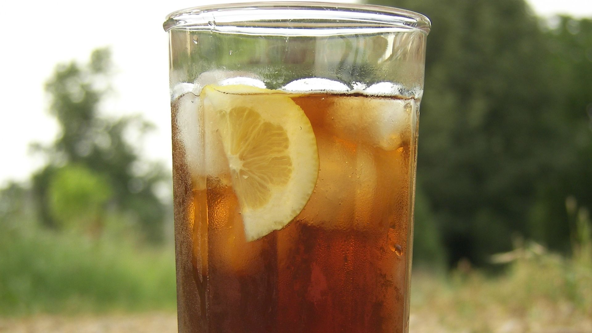 A cool Glass of Ice tea on a hot summer day ..