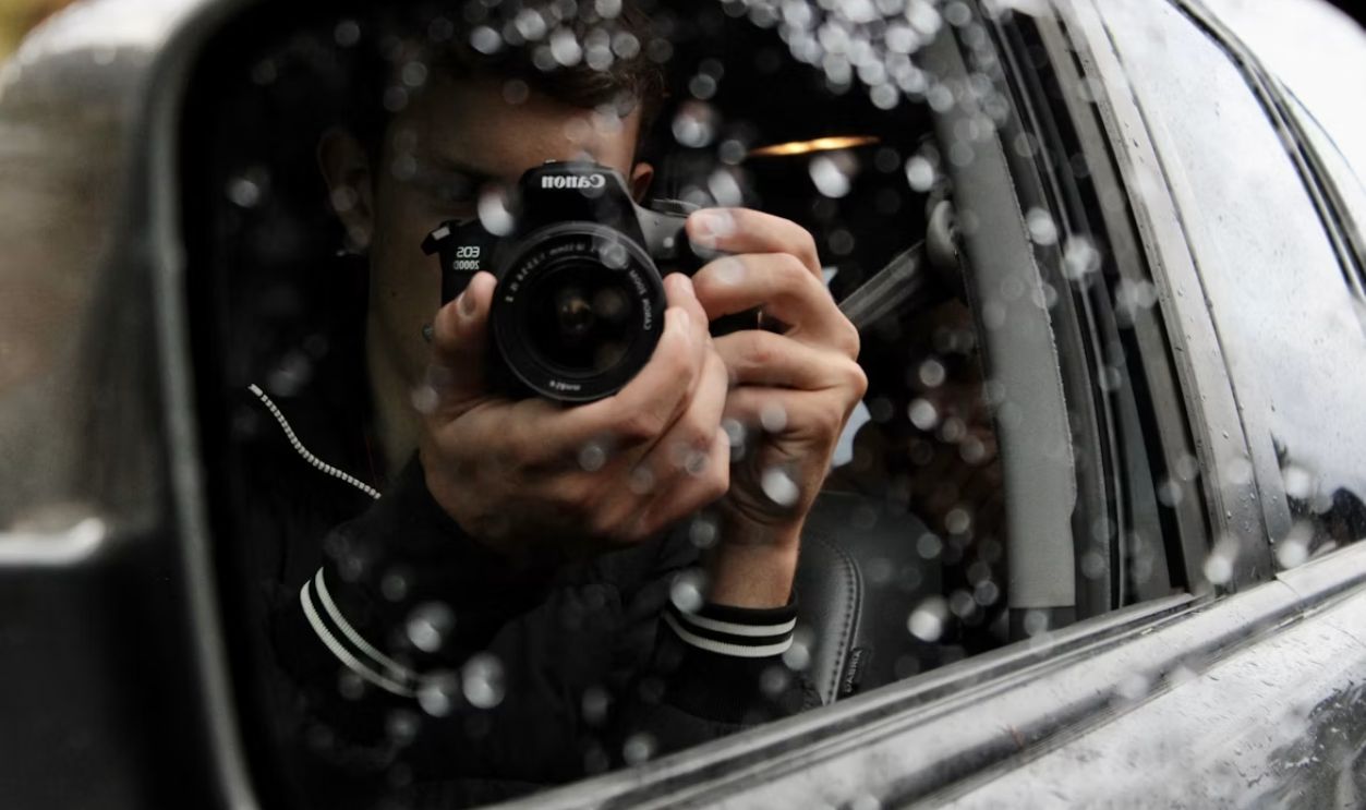 man taking a picture man taking a picture
