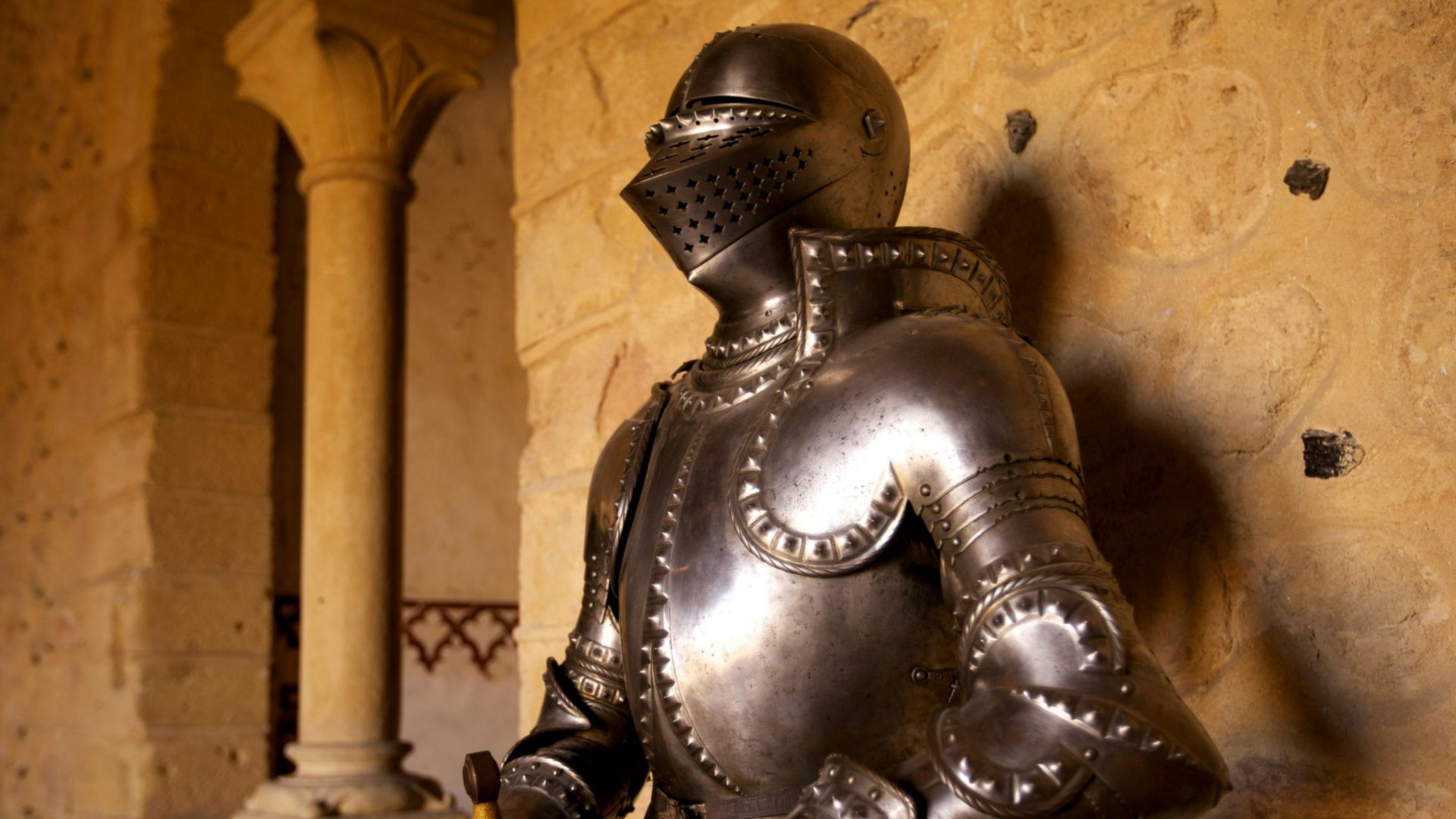a statue of a knight holding a sword