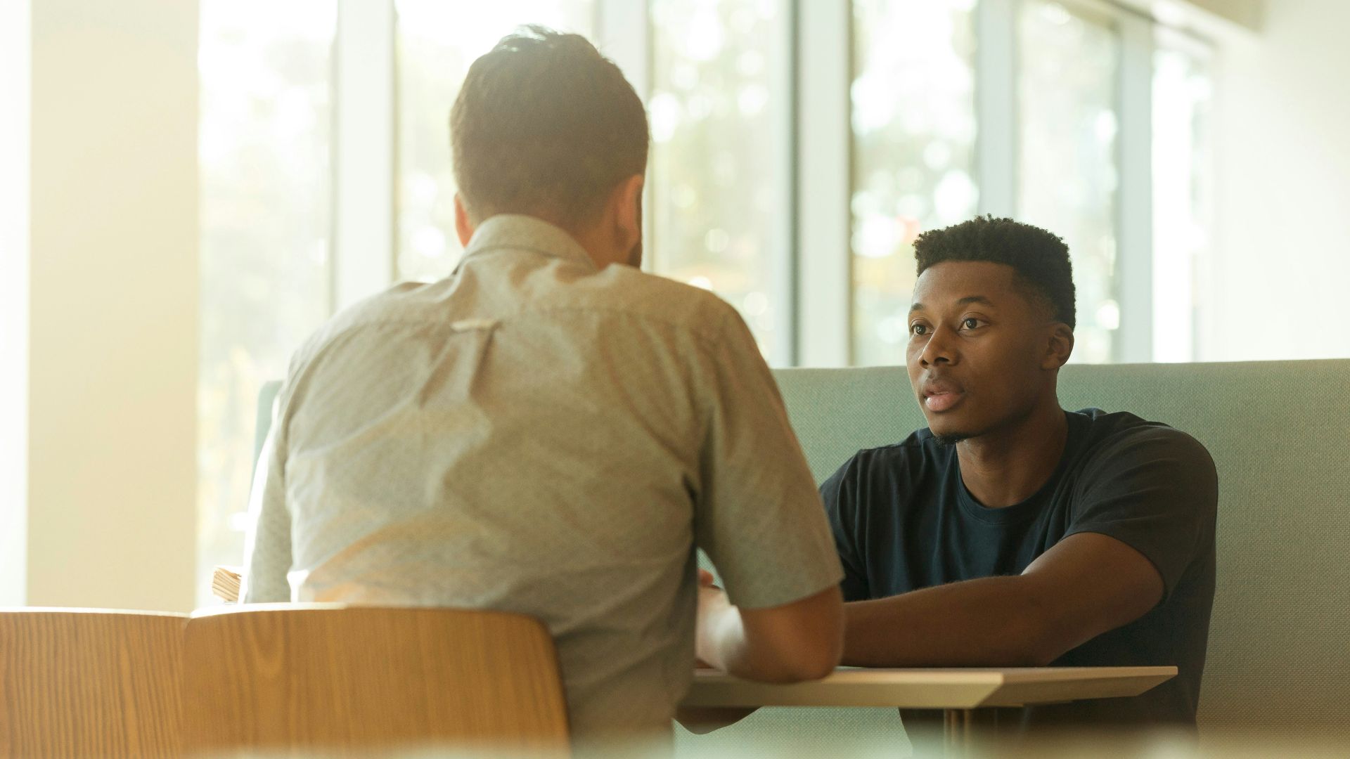 two men talking