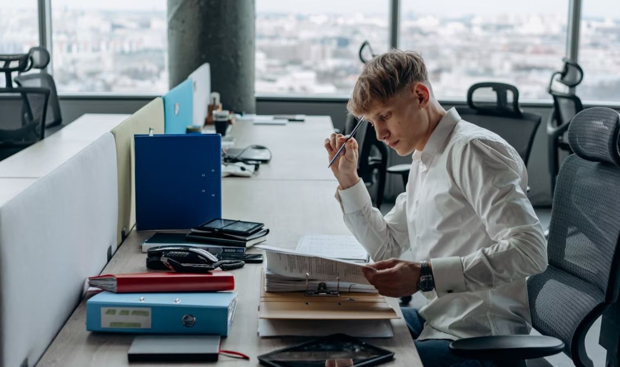 man reviewing documents