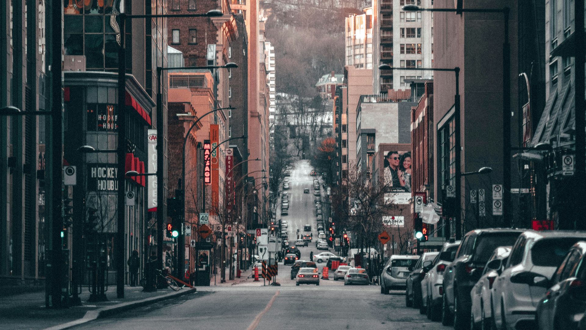 cars on street near high rise buildings