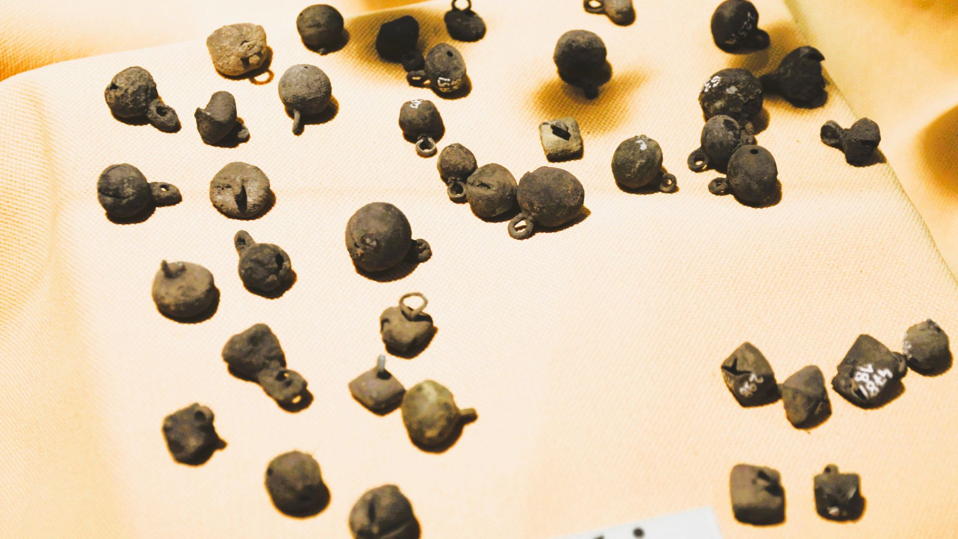 Yotvingians' wear, little bronze button-bells for robes