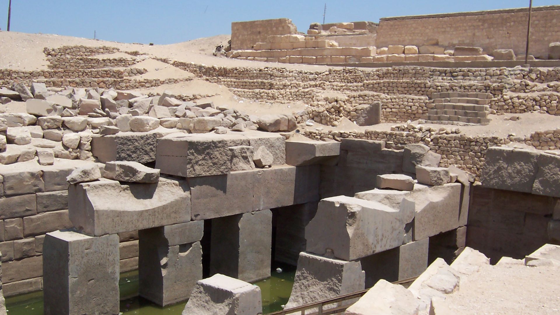 Photo taken in July C.E.2004, Abydos, Egypt. You can see the current status of the Osireion.