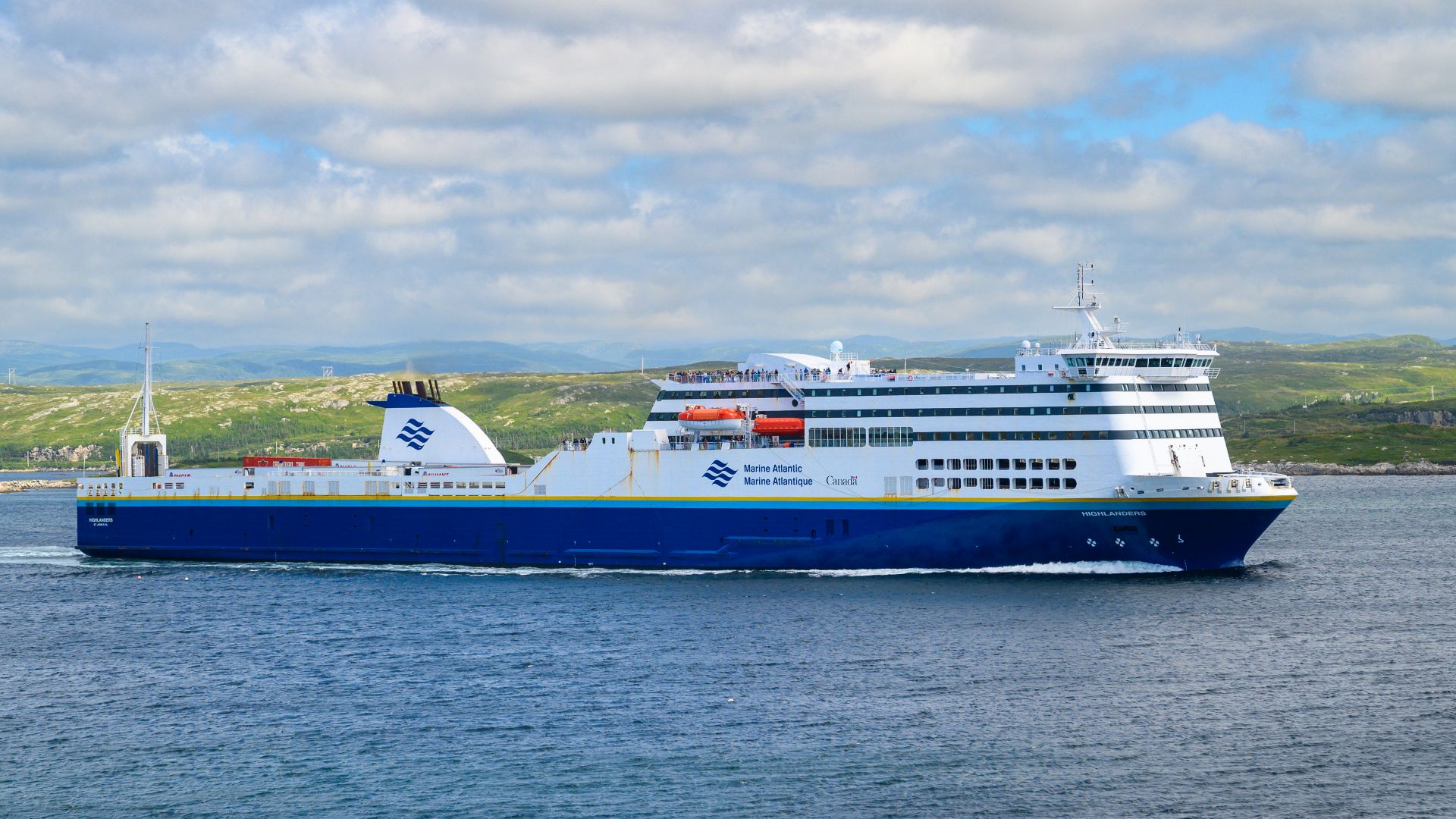Marine Atlantic ROPAX ferry, HIGHLANDERS - IMO 9331189, leaving the harbor at Channel-Port aux Basques, Newfoundland, Canada on August 21, 2022.