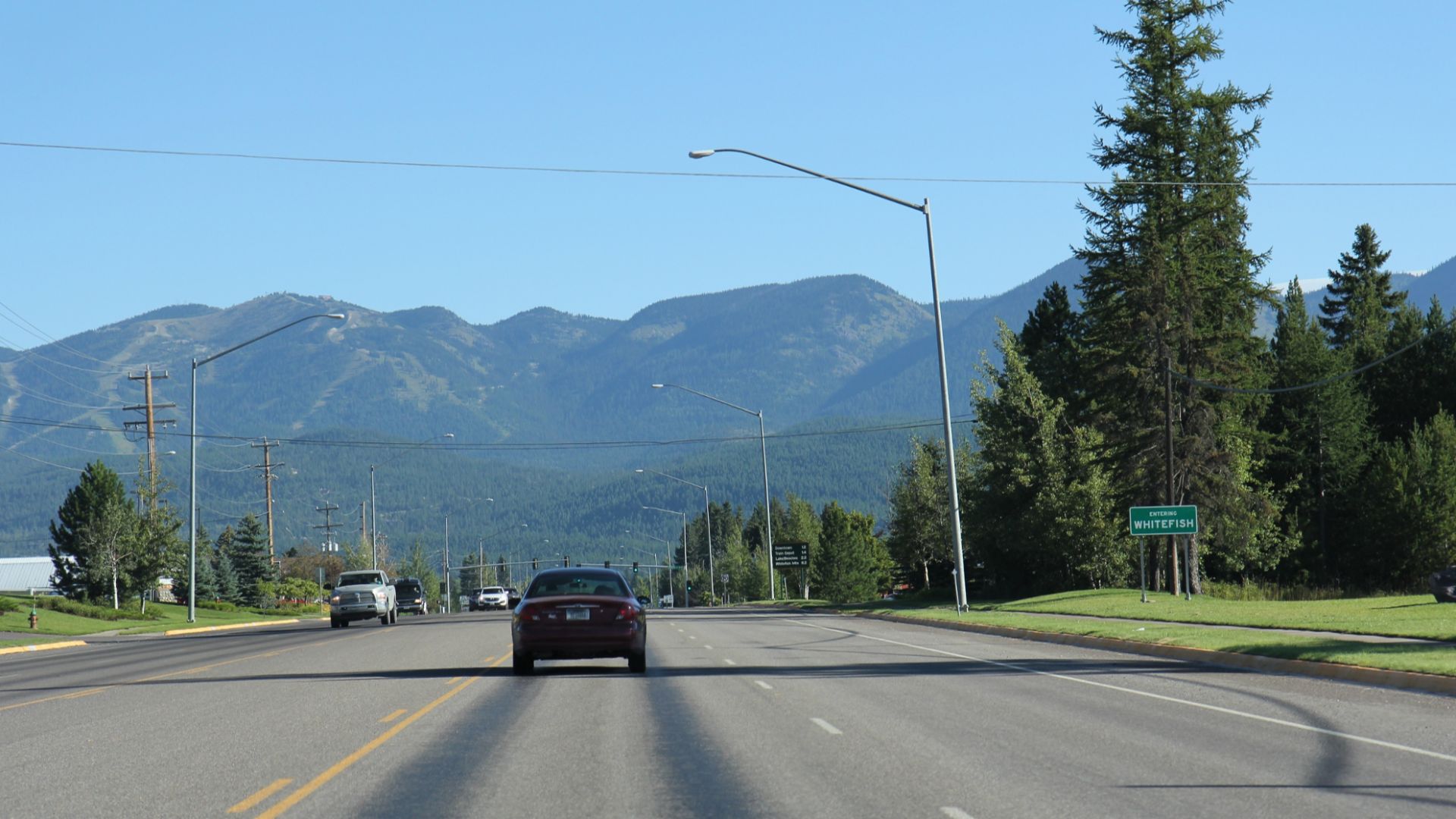 Looking north at the sign for w:Whitefish, Montana on w:U.S. Route 93.