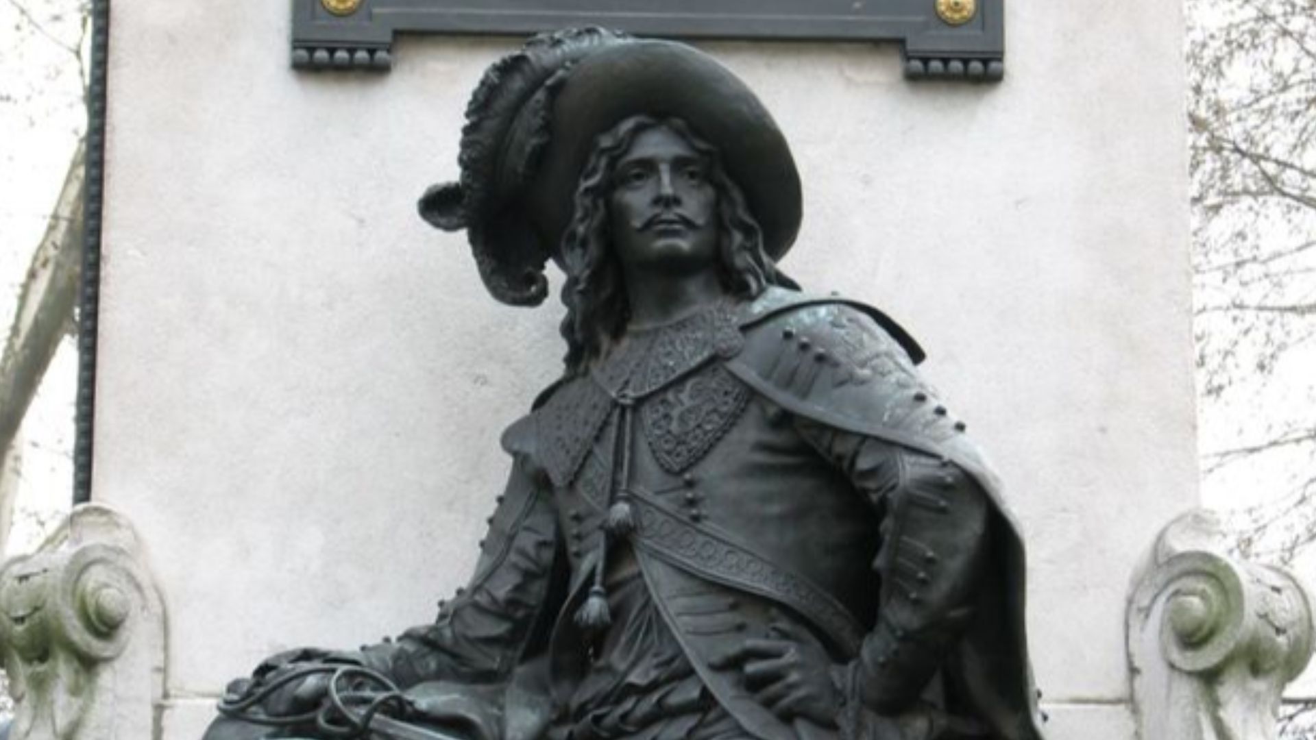 Monument to Alexandre Dumas in the 17th arrondissement of Paris, General Catroux Square, back view, the pedestal is decorated with characters of Dumas' novels, on this side - the most famous of them - d'Artagnan.