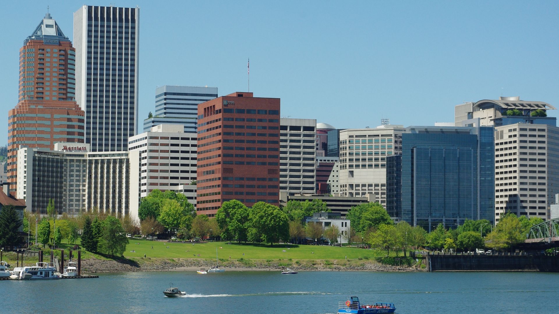 South downtown w:Portland, Oregon. KOIN Center on far left (pyramid top); Wells Fargo Center (tallest building, white); Umpqua Bank Plaza (brick near center); Green-Wyatt Federal Building (behind Umpqua on right); First & Main Building (dark glass on righ
