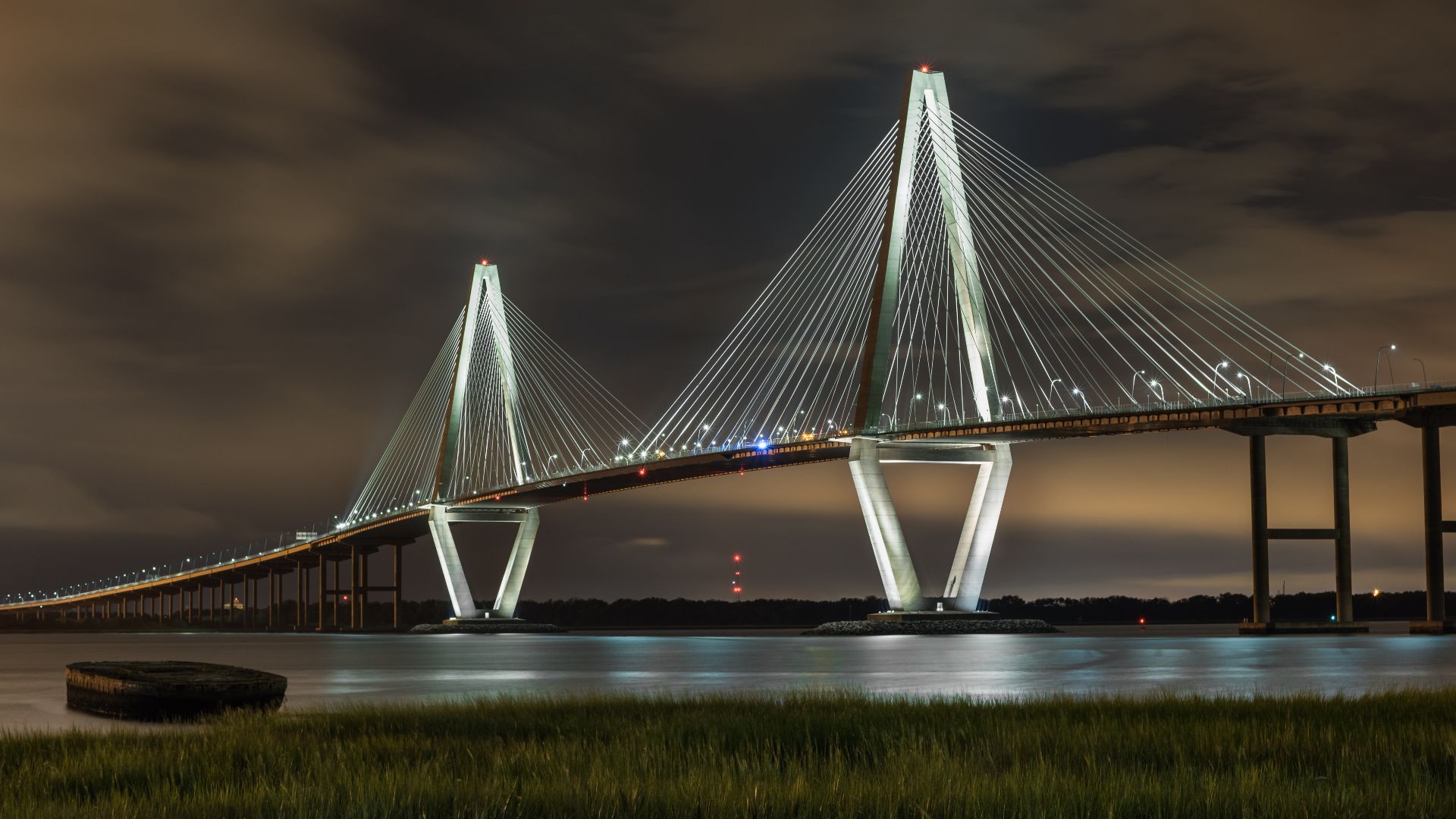 Arthur Ravenel Jr. Bridge (also known as the Cooper River Bridge) at night, looking northwest from Mount Pleasant, South Carolina.