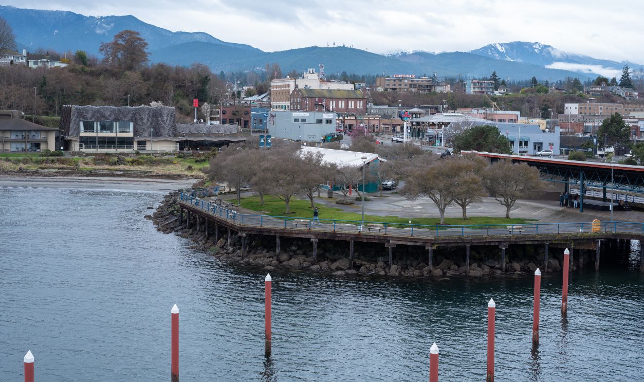 Port Angeles, Washington, United States - March 2, 2020: Elevated view of harbor, shops and park on the water