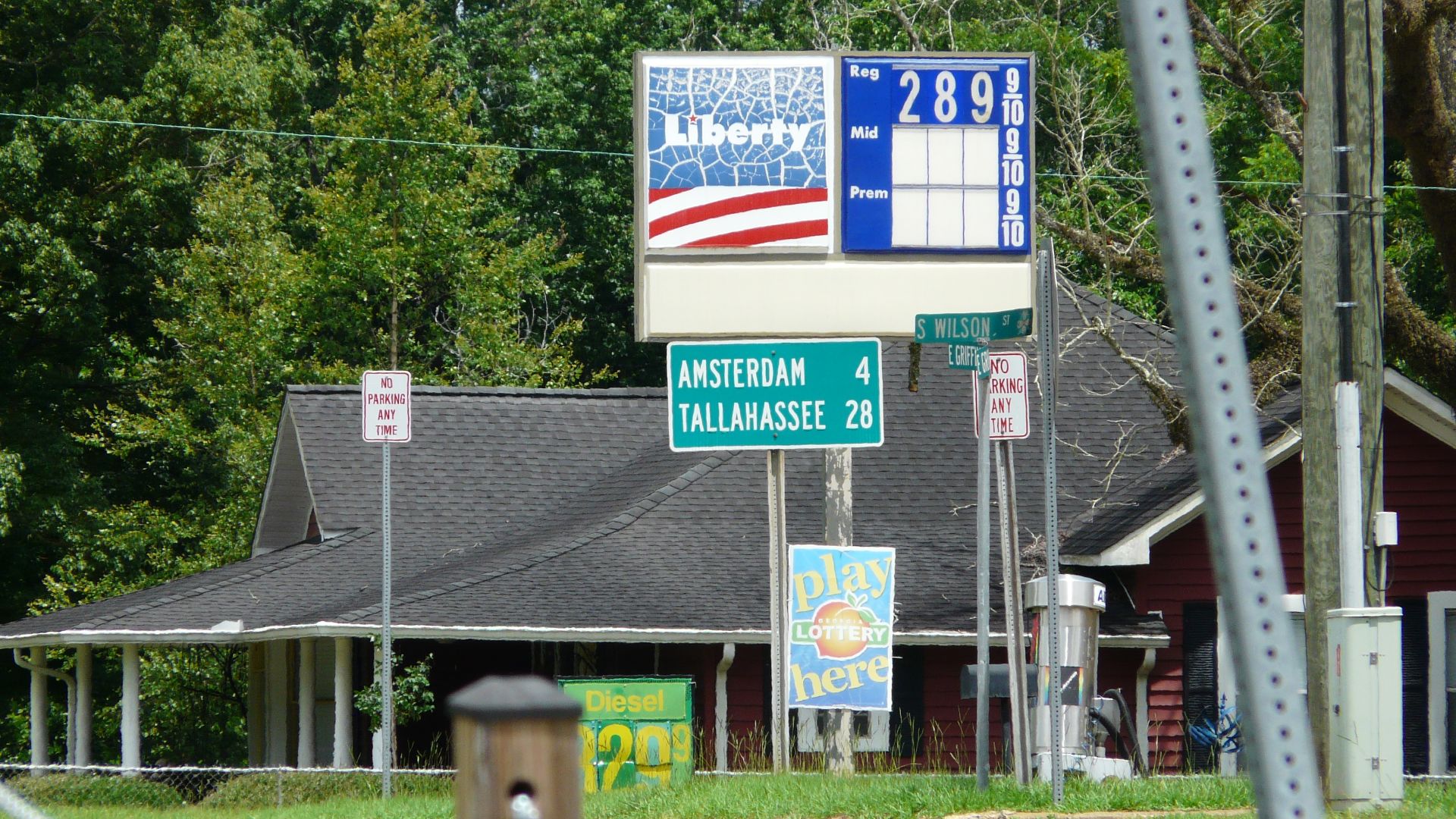 Mileage road sign on southbound U.S. Route 27 Business in Attapulgus, Georgia.