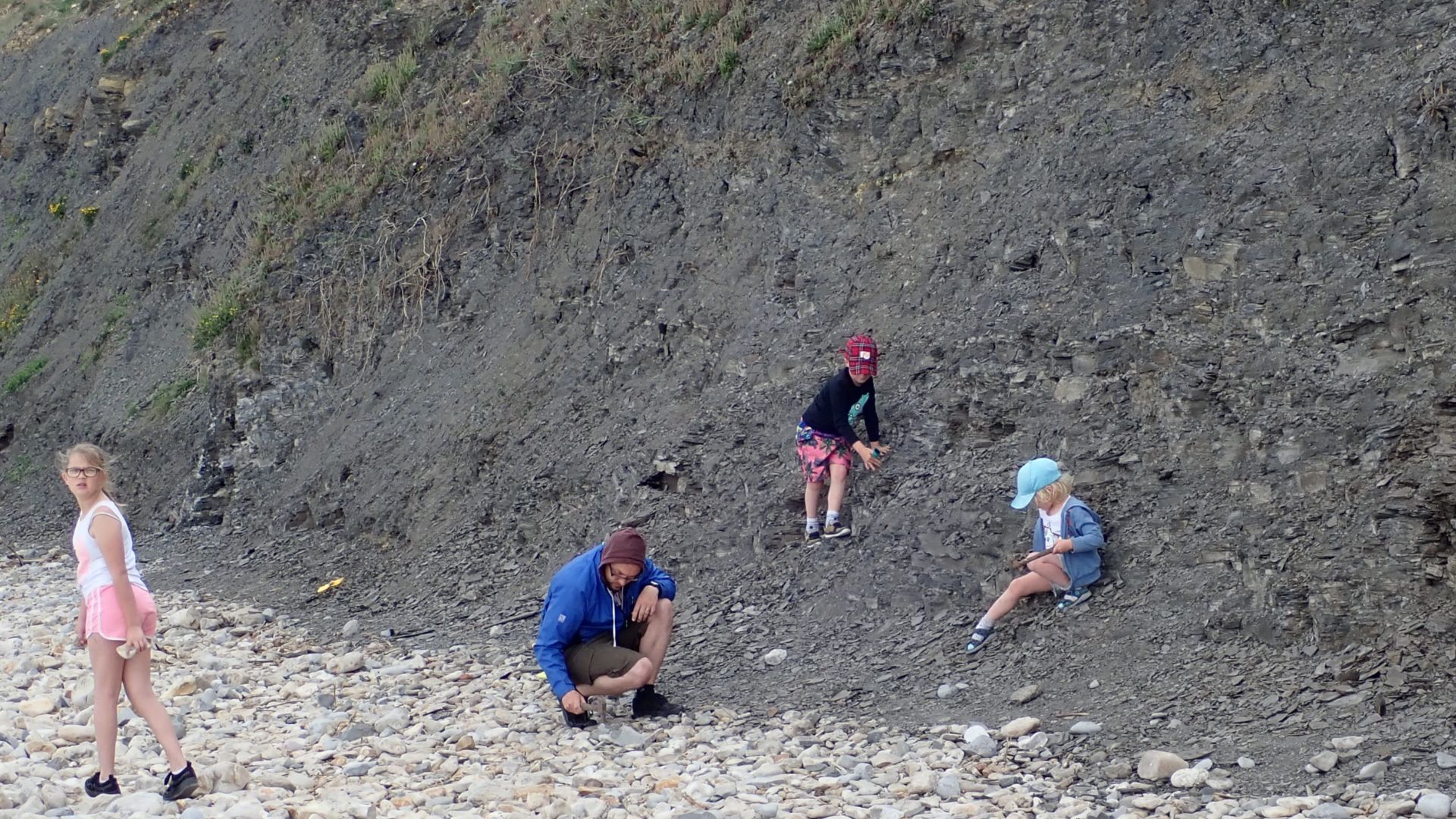 Amateur fossil hunters on Charmouth beach