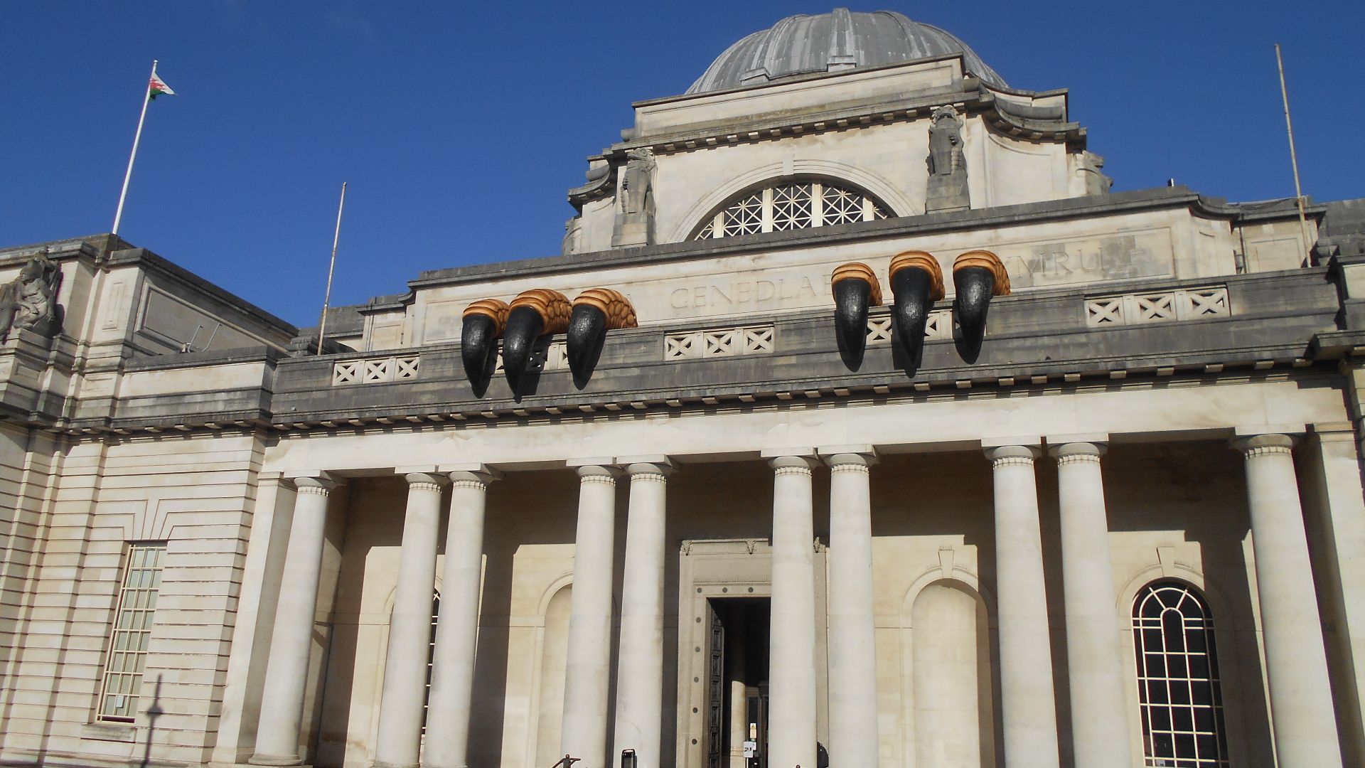National Museum Cardiff from Gorsedd Gardens Road, with temporary dinosaur claws.