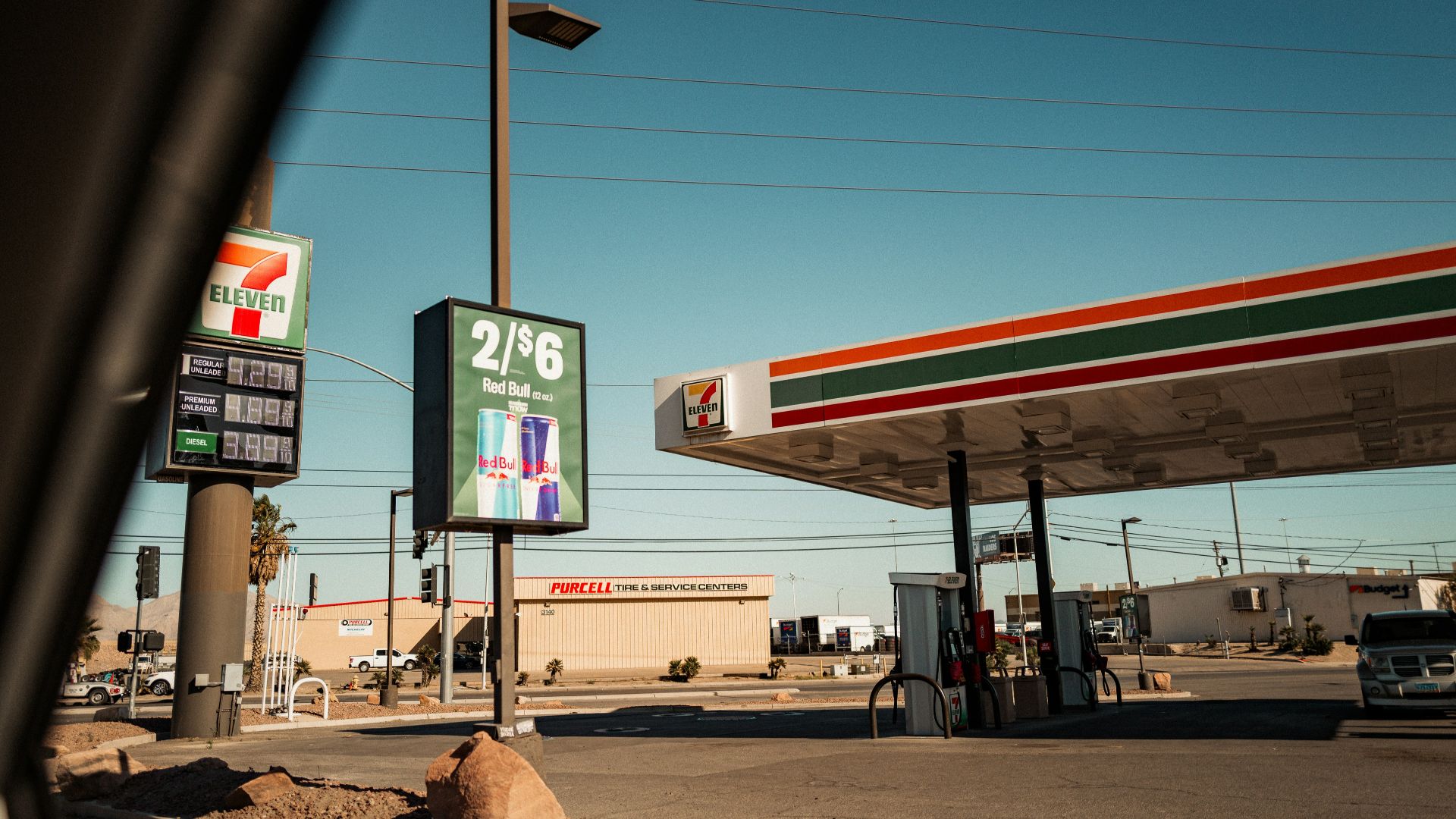 a gas station with a sign for a gas station