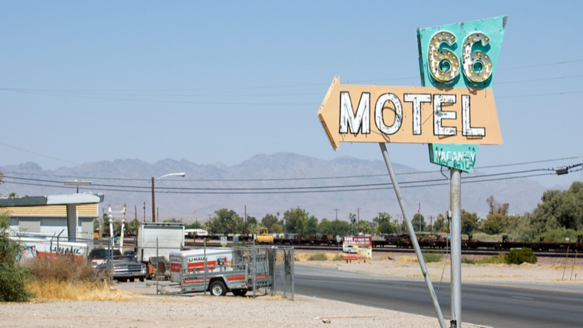 Route 66 Motel sign pointing the way in Needles (original source erroneously indicates Victorville, CA).