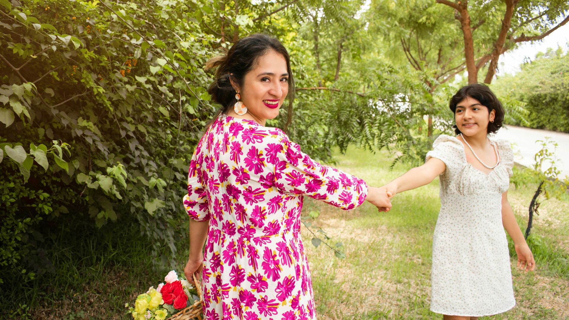 a couple of women standing next to each other