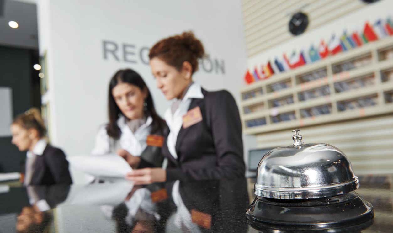 Modern luxury hotel reception counter desk with bell
