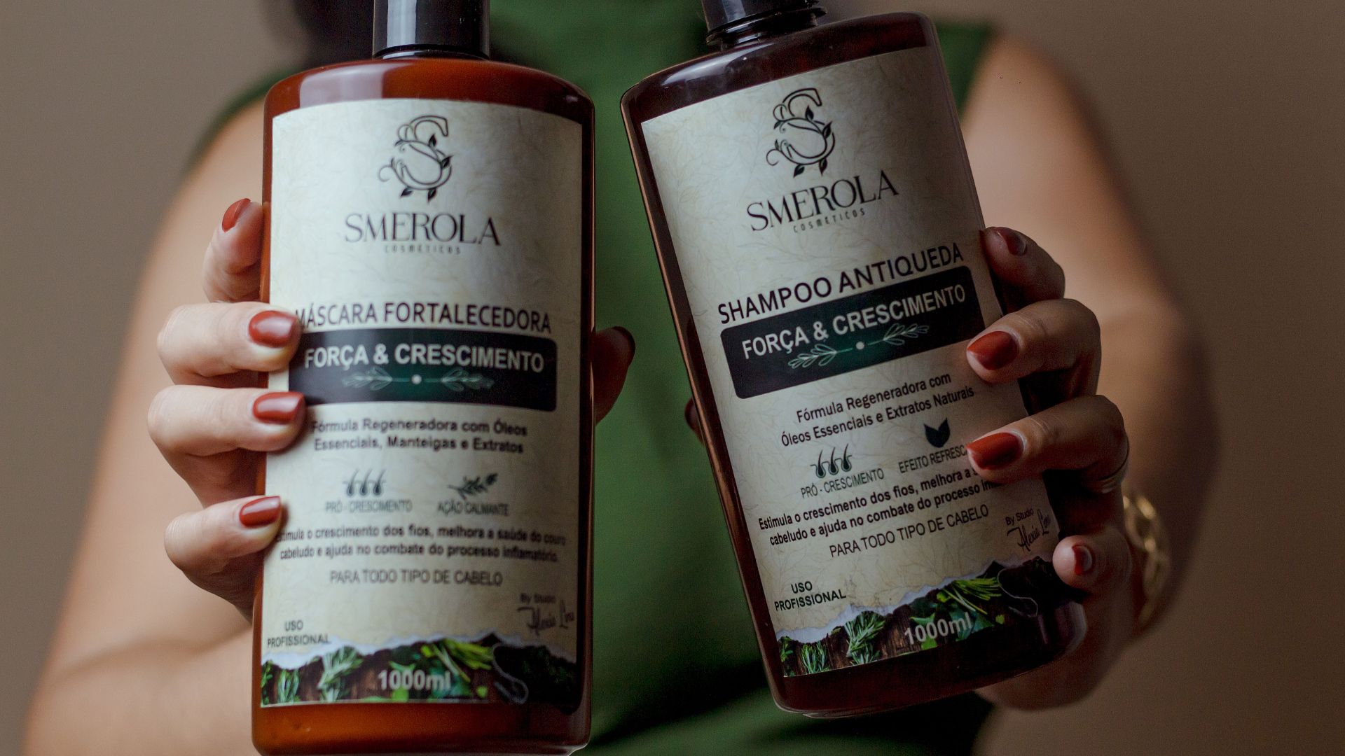 Close-up of Smerola hair care bottles focusing on growth and strength benefits.