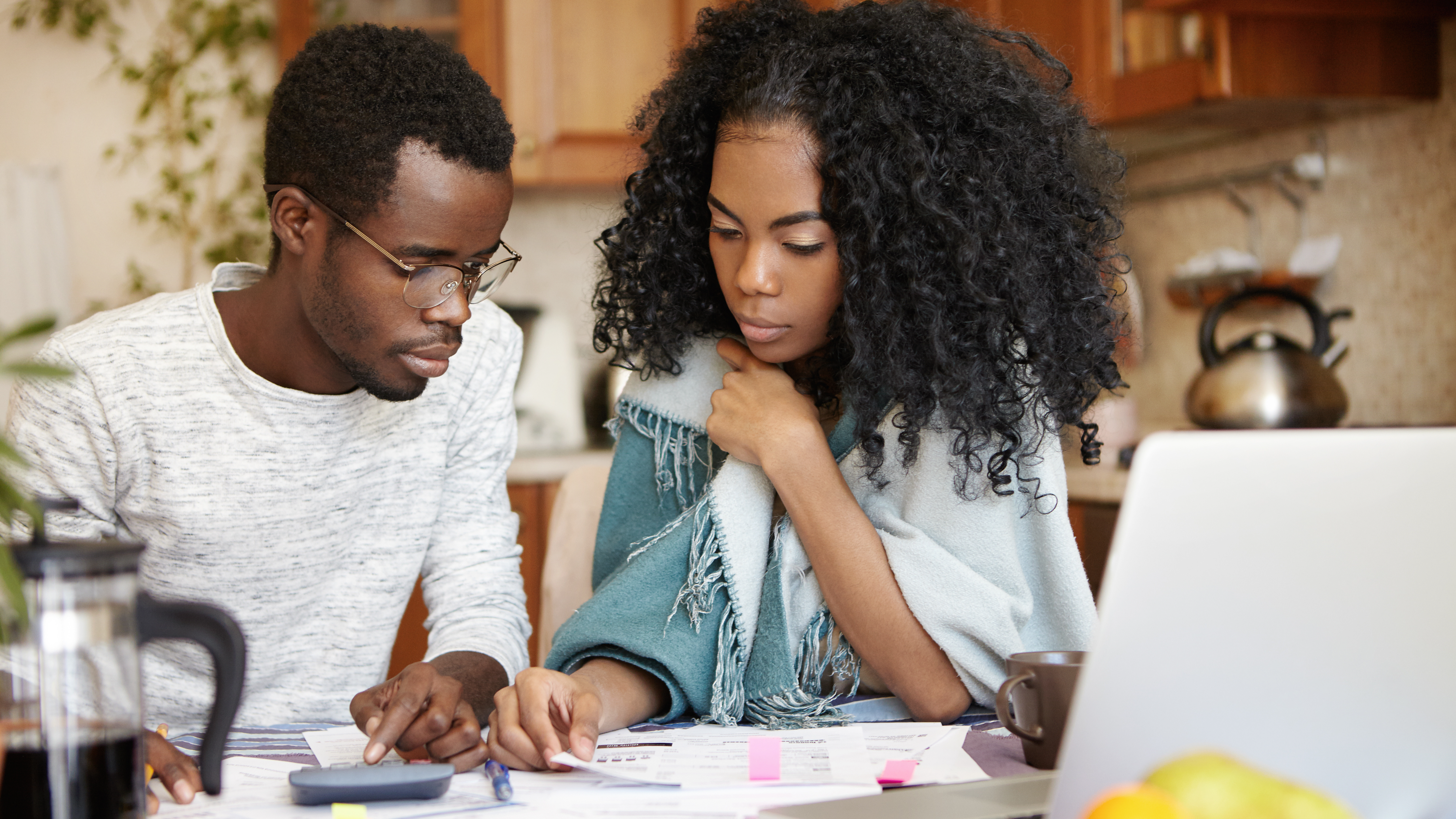 A couple doing paperwork together