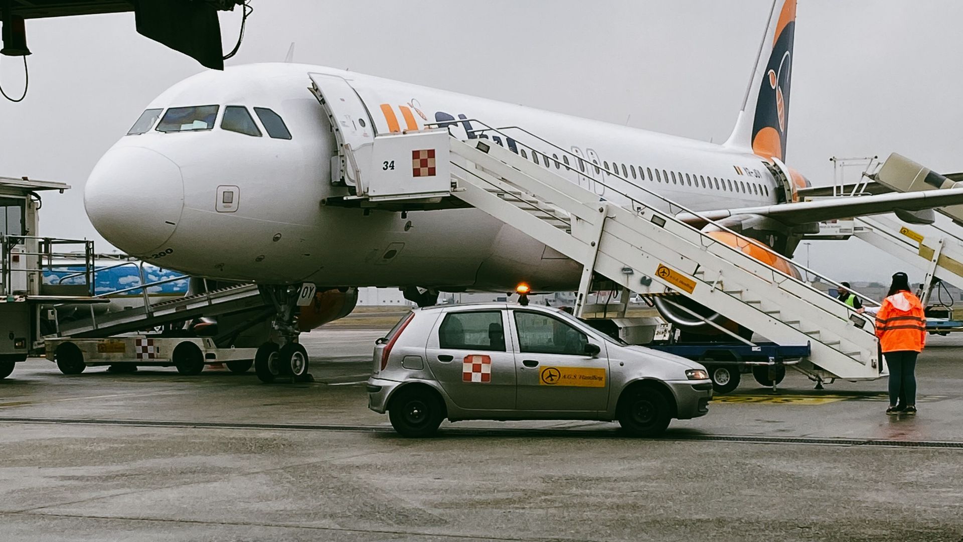 Passenger jet preparing for boarding at Orio al Serio Airport in Lombardia, Italy.