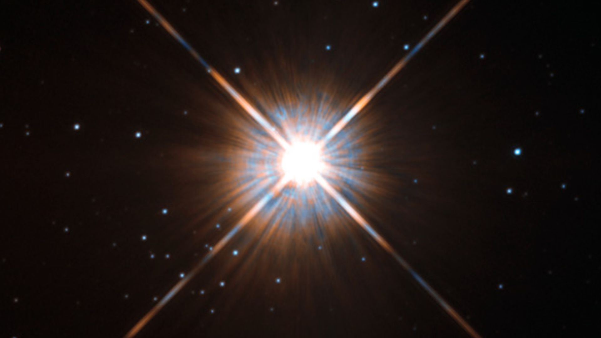 Shining brightly in this Hubble image is our closest stellar neighbour: Proxima Centauri.
Proxima Centauri lies in the constellation of Centaurus (The Centaur), just over four light-years from Earth. Although it looks bright through the eye of Hubble, as 