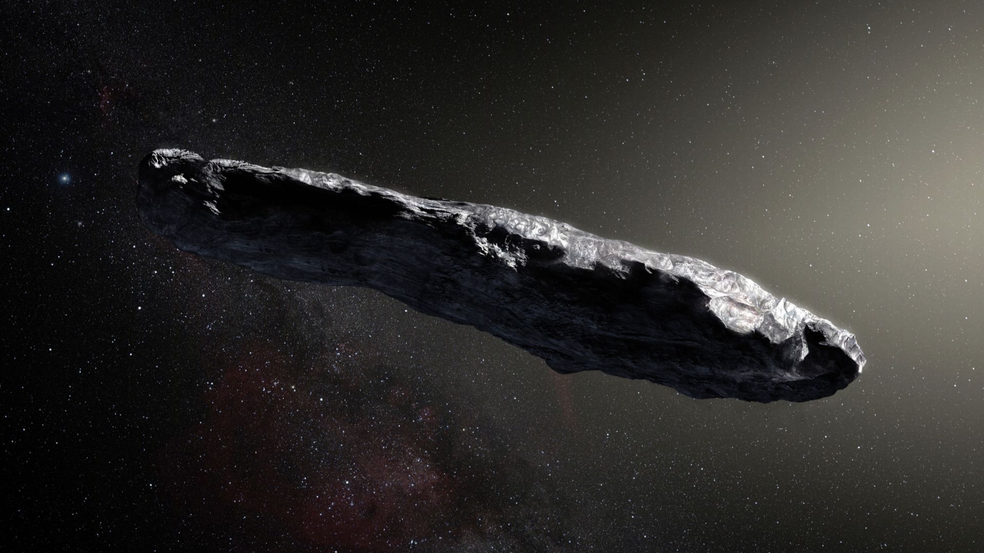 This artist’s impression shows the first interstellar asteroid: `Oumuamua. This unique object was discovered on 19 October 2017 by the Pan-STARRS 1 telescope in Hawai`i. Subsequent observations from ESO’s Very Large Telescope in Chile and other observator