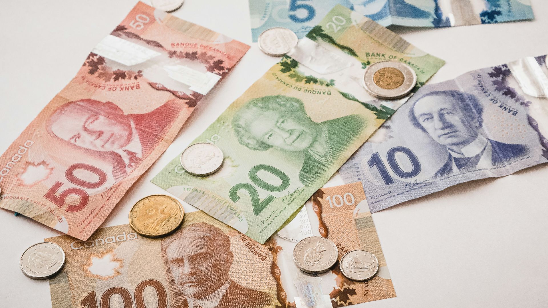 a bunch of money sitting on top of a table