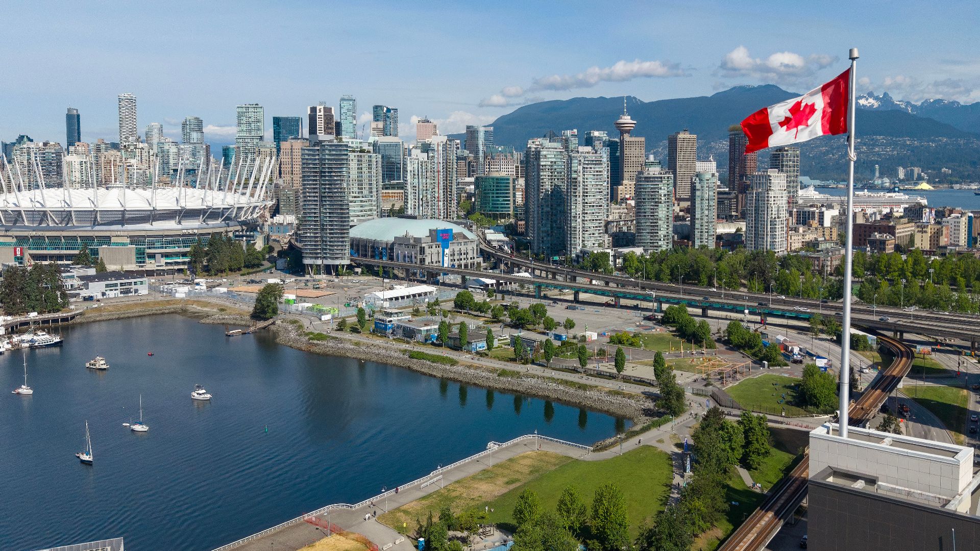 Skyline view of downtown Vancouver, British Columbia, Canada’s third-largest metropolitan area and a major Pacific port city shaped by Asian immigration, mountain geography, and dense urban development.