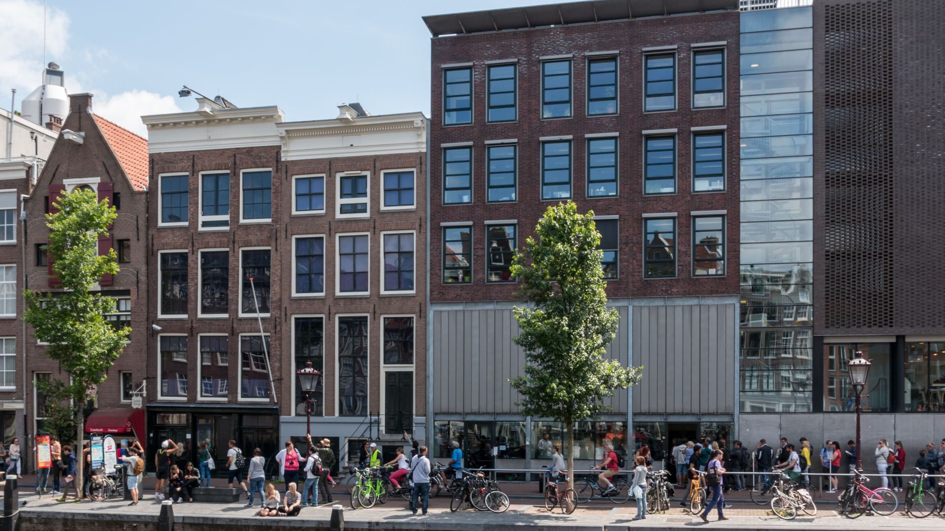 Anne Frank House (black facade at ground level) on the Prinsengracht in Amsterdam, Netherlands