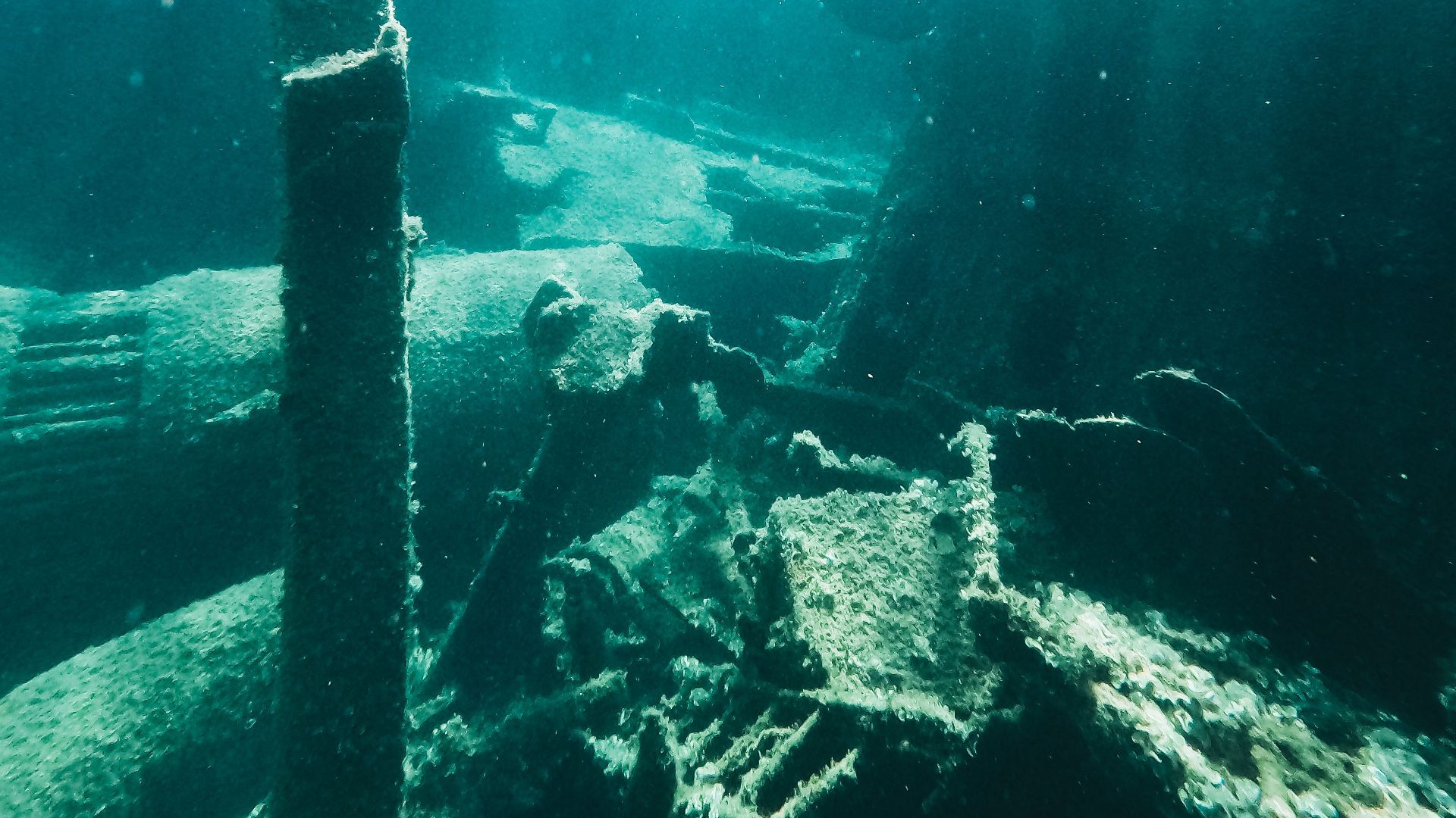 Explore the mystery of an underwater shipwreck in the ocean's depths.