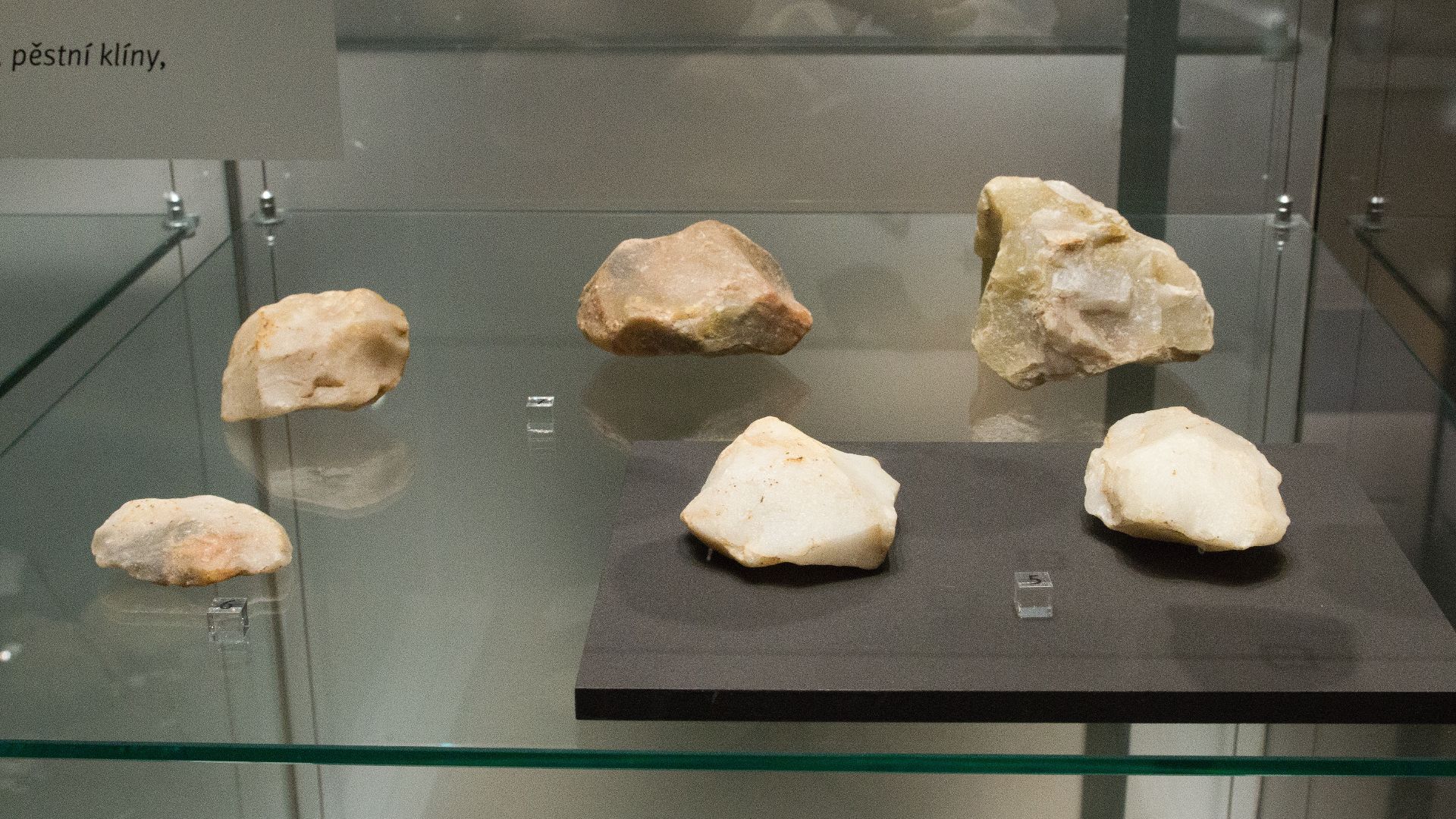 Middle Paleolithic tools from Stříbro (Tachov District), cca 250 000 – 40 000 BC. (5) Stone hand axes. Museum of Western Bohemia in Pilsen.