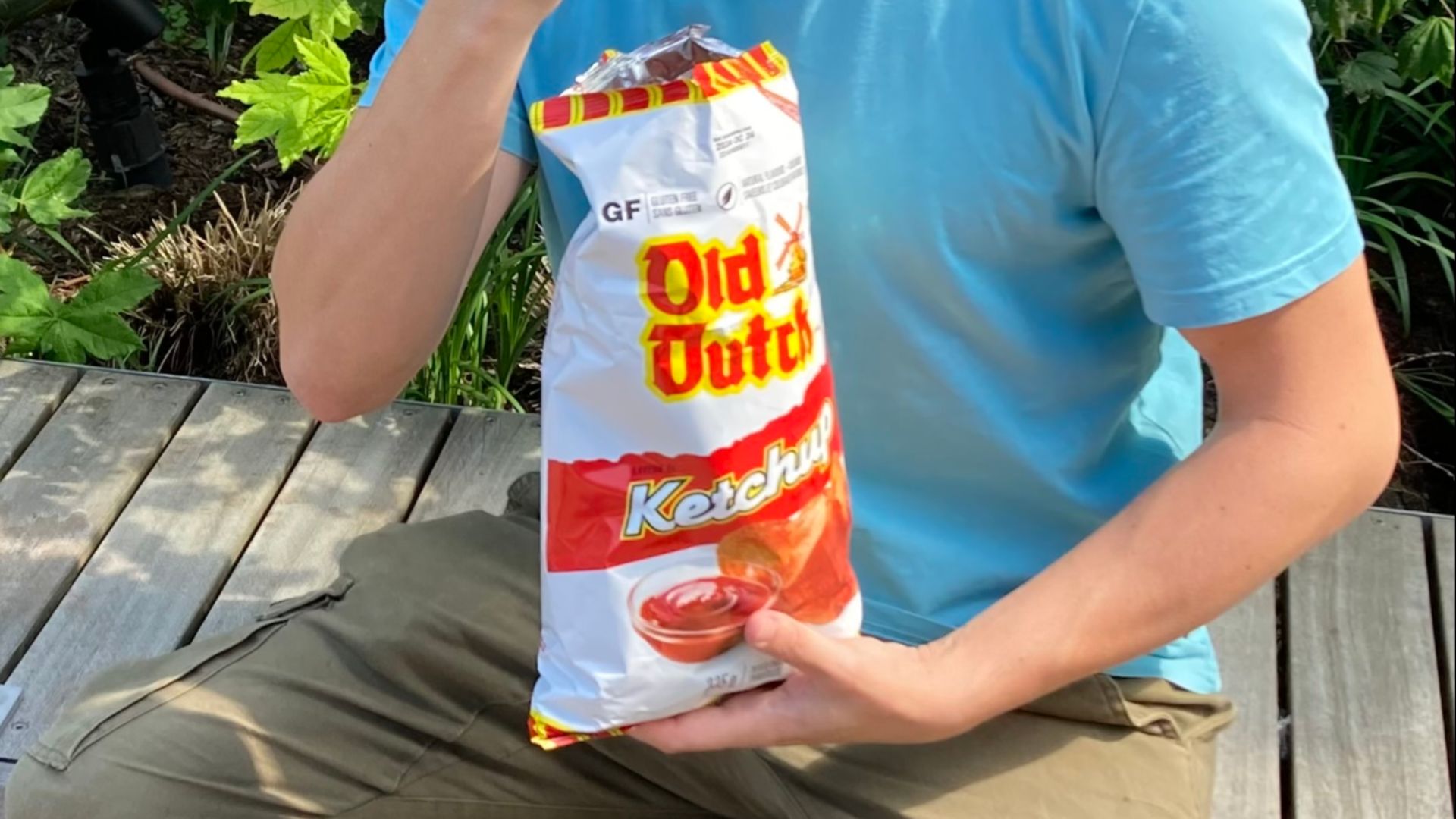 Man enjoying a ketchup chip