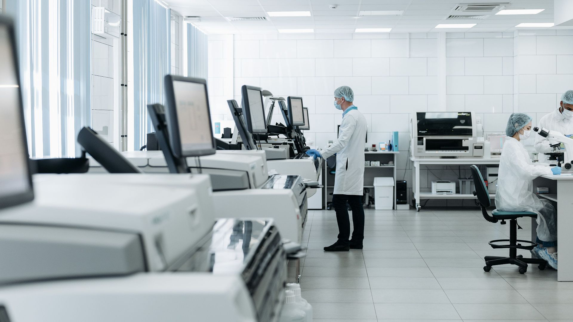 Scientists conducting research in a state-of-the-art laboratory with advanced equipment.
