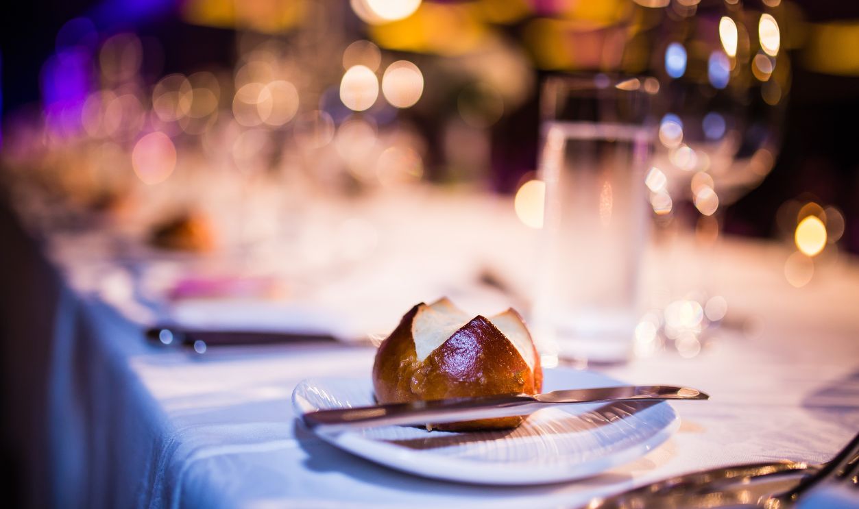 Bread and buns on a plate in a restaurant closeup