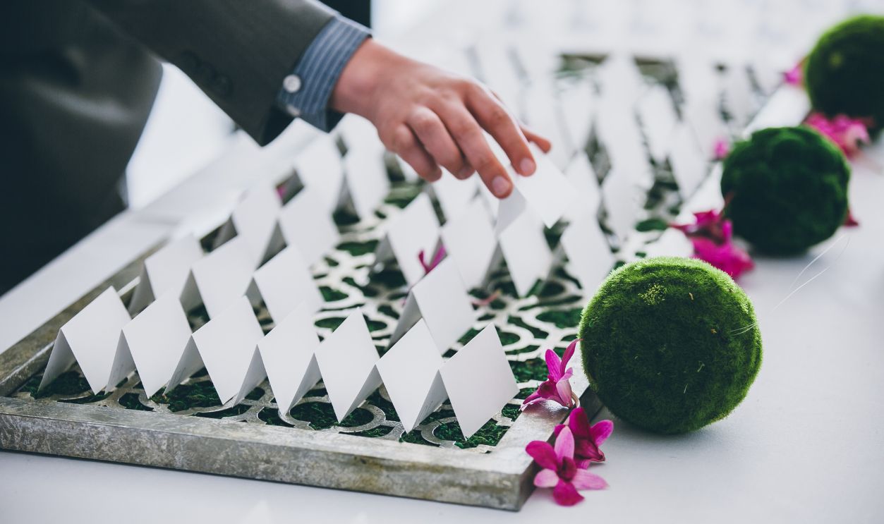 Place Card being picked up