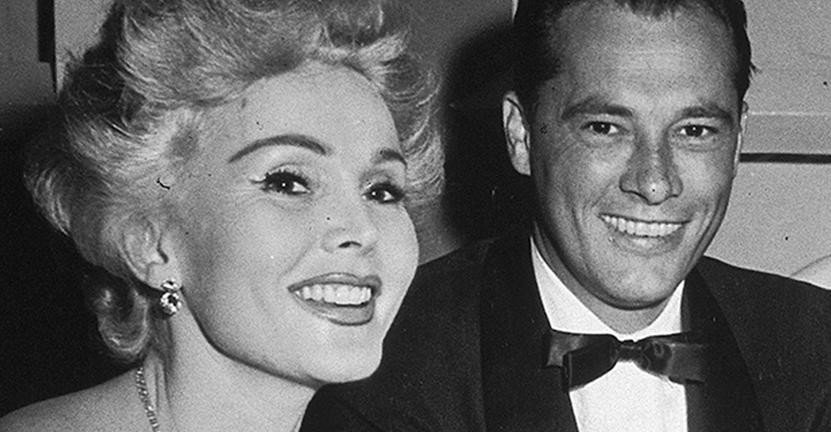 13th June 1957, Hungarian-born actor Zsa Zsa Gabor, hotel heir Conrad 'Nicky' Hilton (926 - 1969), and American actor Natalie Wood (1938 - 1931) at Mike Romanoff's Restaurant. They had been attending the premiere of the film 'Island in the Sun.'
