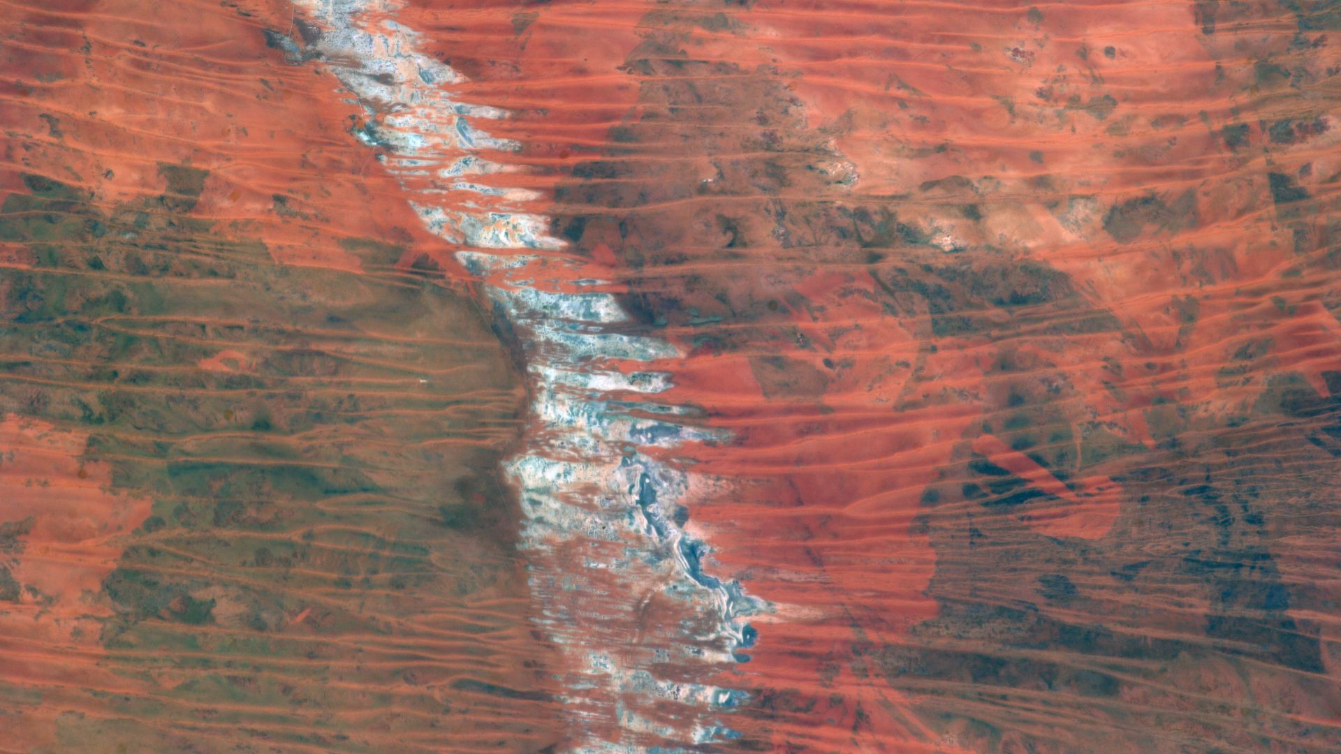 One of the Expedition 35 crew members aboard the Earth-orbiting International Space Station used a 400 millimeter lens to photograph this view of the Great Sandy Desert, northwestern Australia on March 25.
It bears evidence that much of Australia is arid.