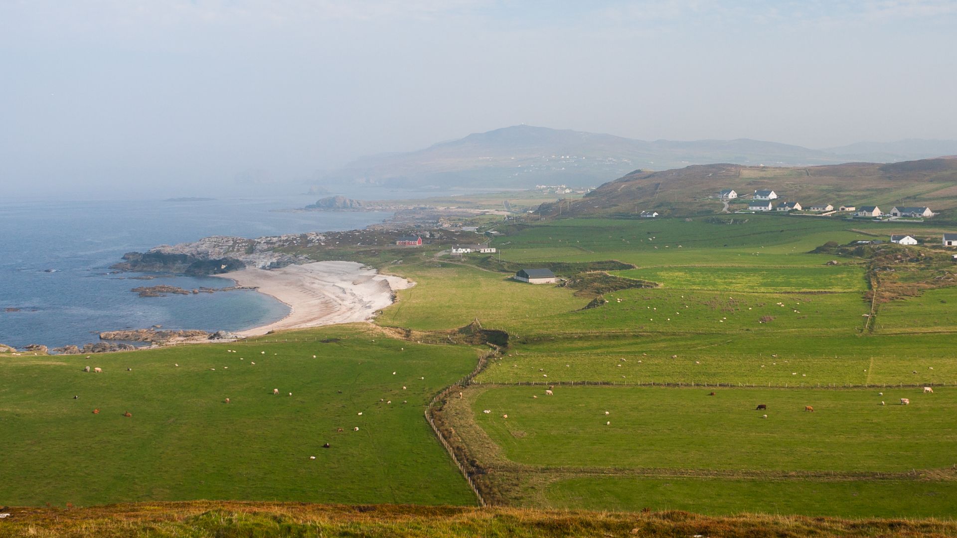 Raised beach of Ballyhillin at Malin Head, Inishowen, County Donegal. From the information panel at Malin Head: As the ice sheets melted 15,000 years ago, the land became lighter. Eventually it rose 100 feet above the former sea level – a process called i