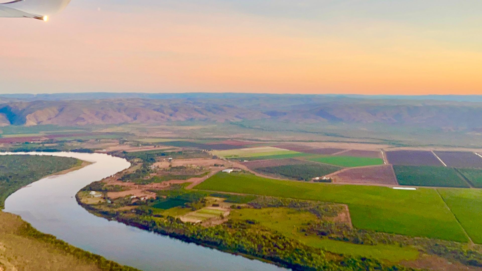 Aerial view of Ord River following take off from East Kimberley Regional Airport, Kununurra, WA, 2022