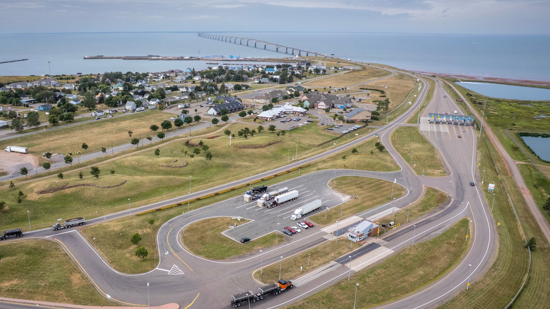 Aerial view of the Confederation Bridge toll plaza in Borden-Carleton, Prince Edward Island.