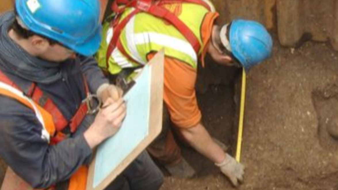 Archaeologists recordin in trench 13 at the Liverpool Street Worksite, Liverpool Street (Crossrail XSM10)