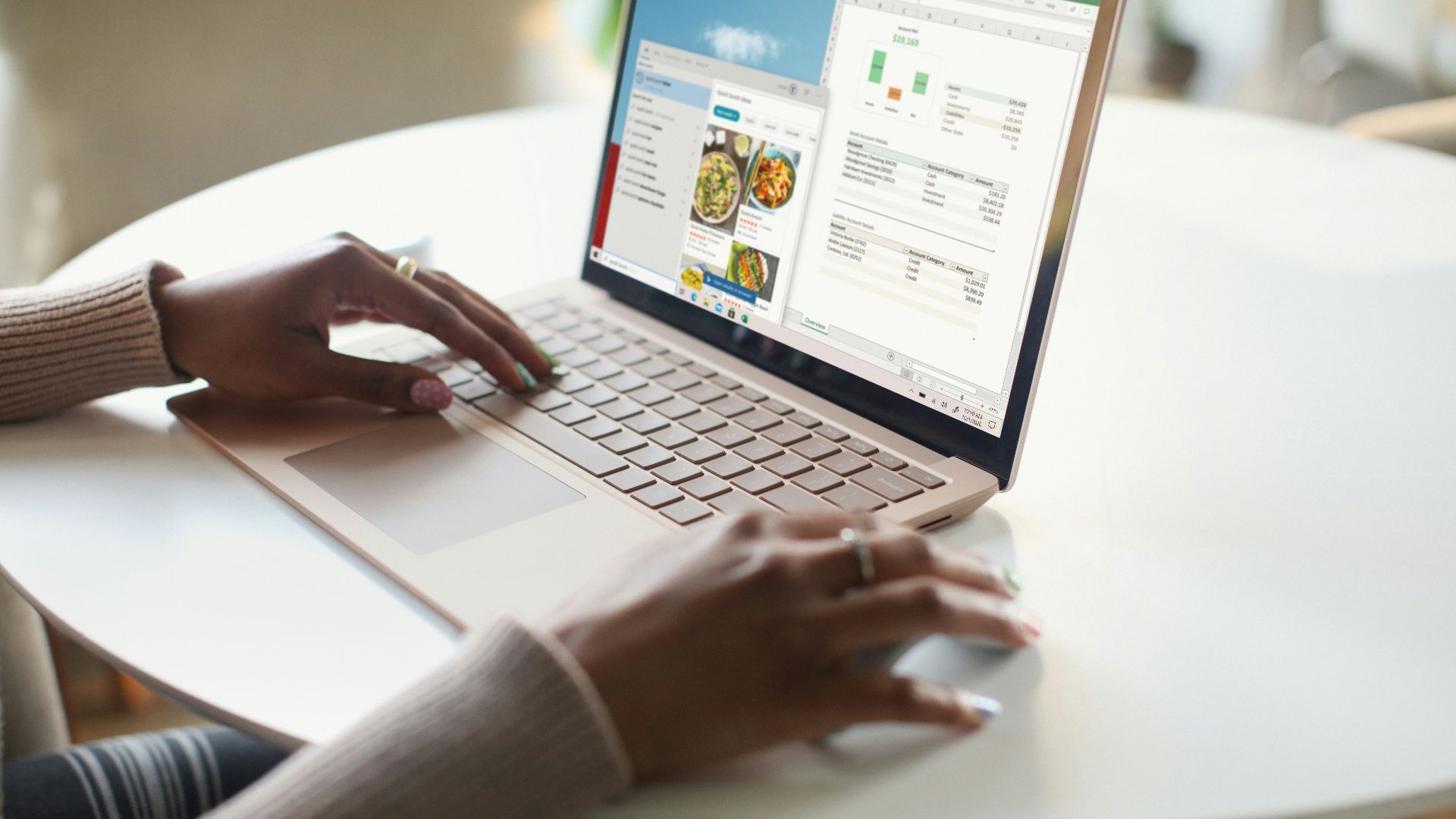 person in gray long sleeve shirt using Surface computer