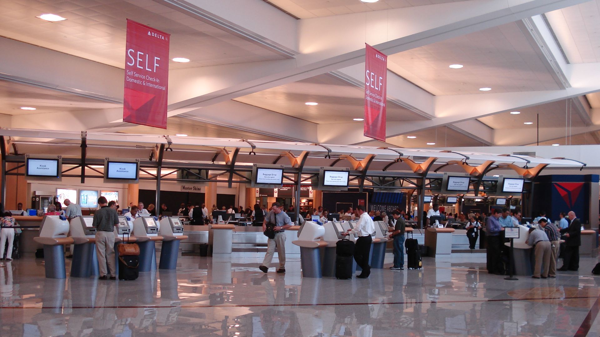 A line of automated and manned ticketing counters for Delta, Atlanta's major tenant airline.